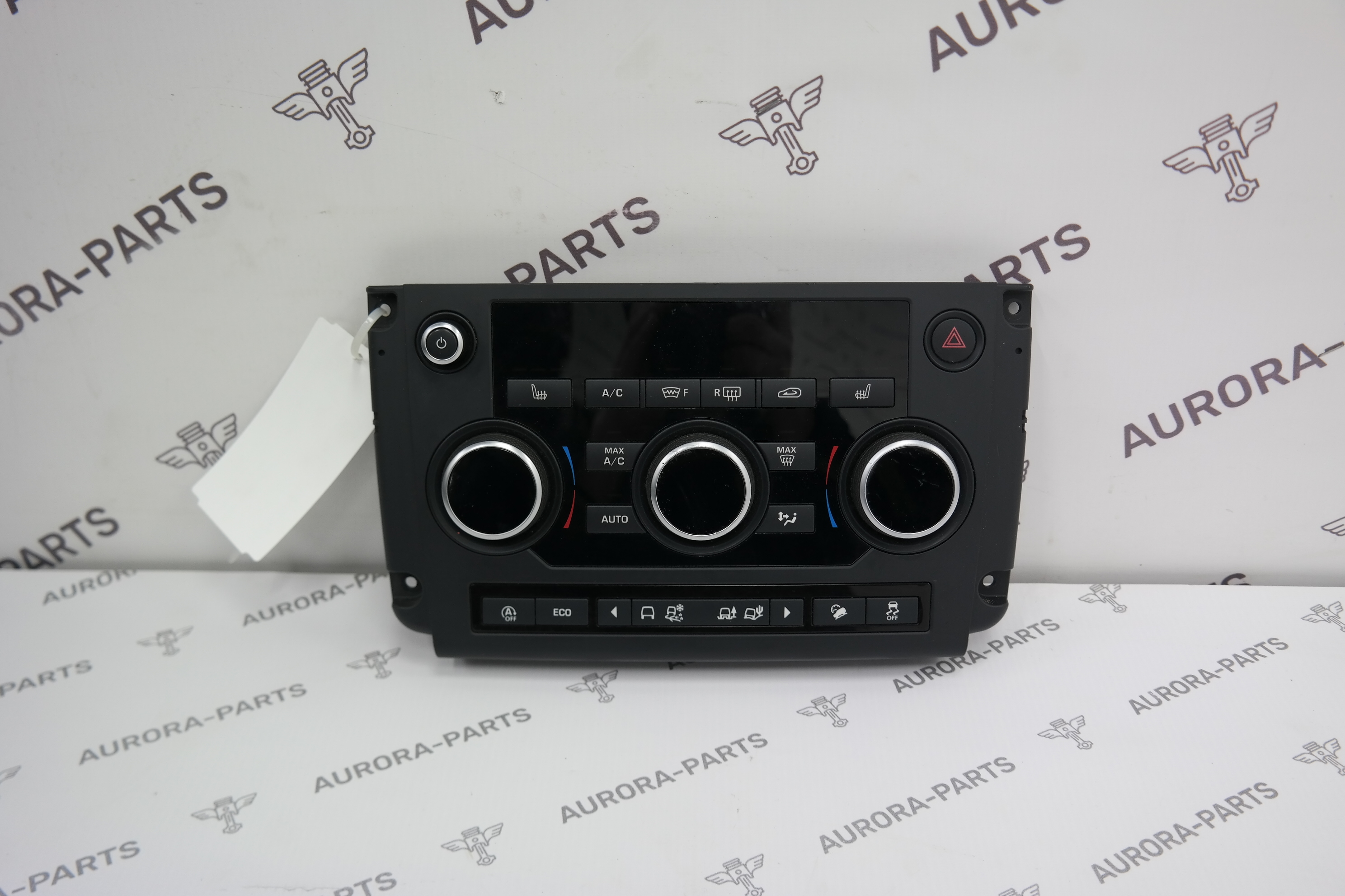 Блок кнопок управления климатконтролем на центральной консоли Land Rover Discovery Sport