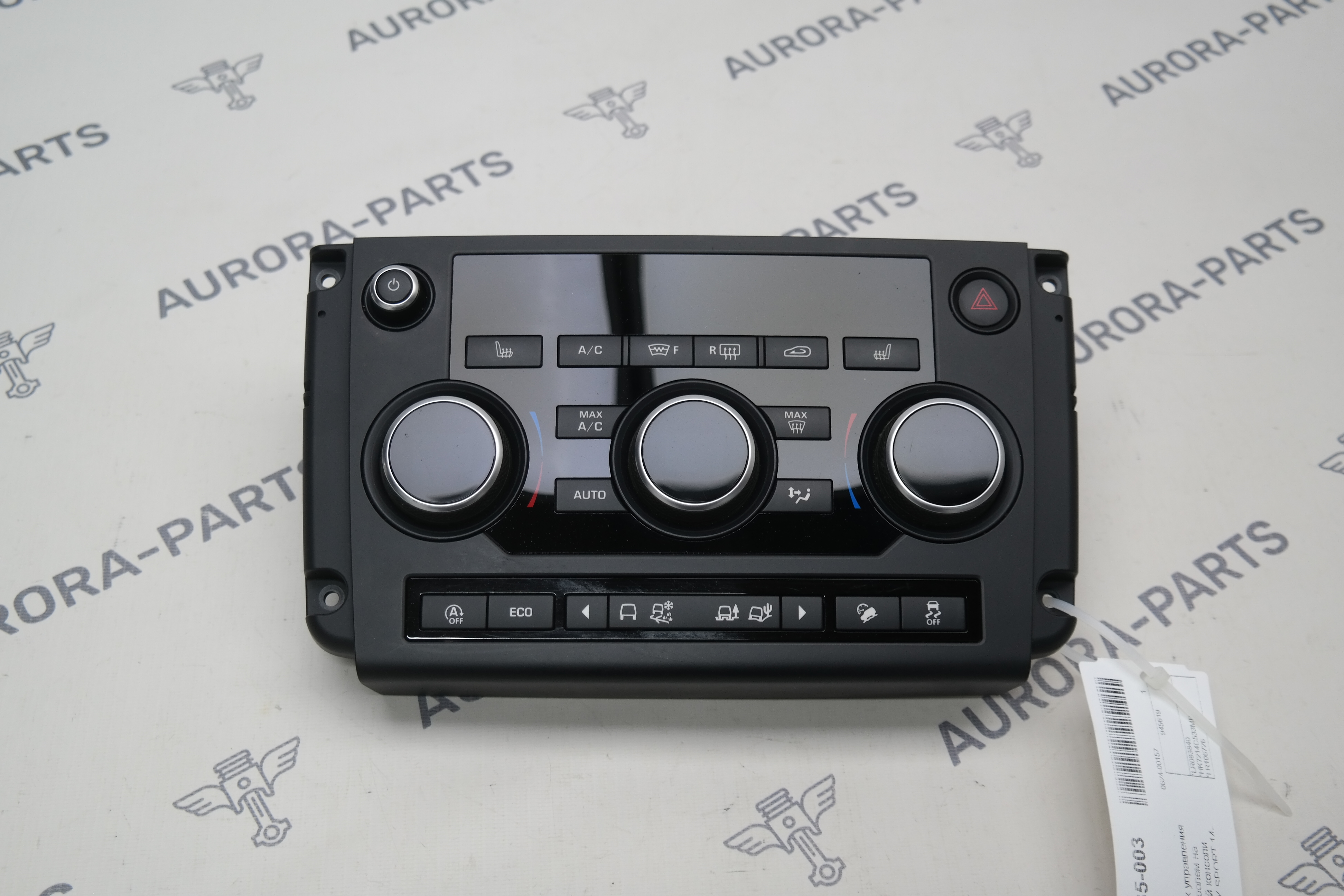 Блок кнопок управления климатконтролем на центральной консоли Land Rover Discovery Sport