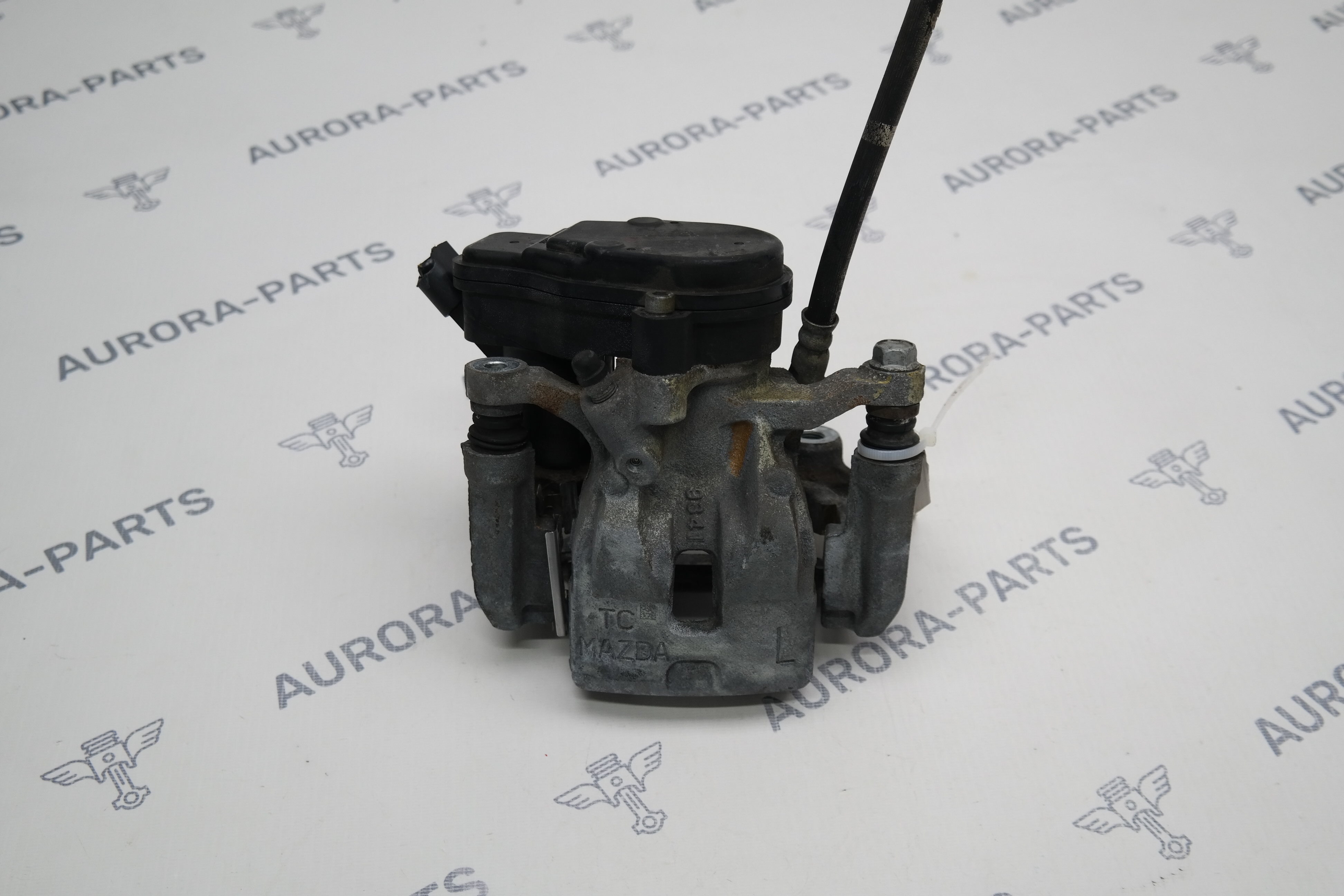 Суппорт тормозной задний в сборе LH Mazda CX-5