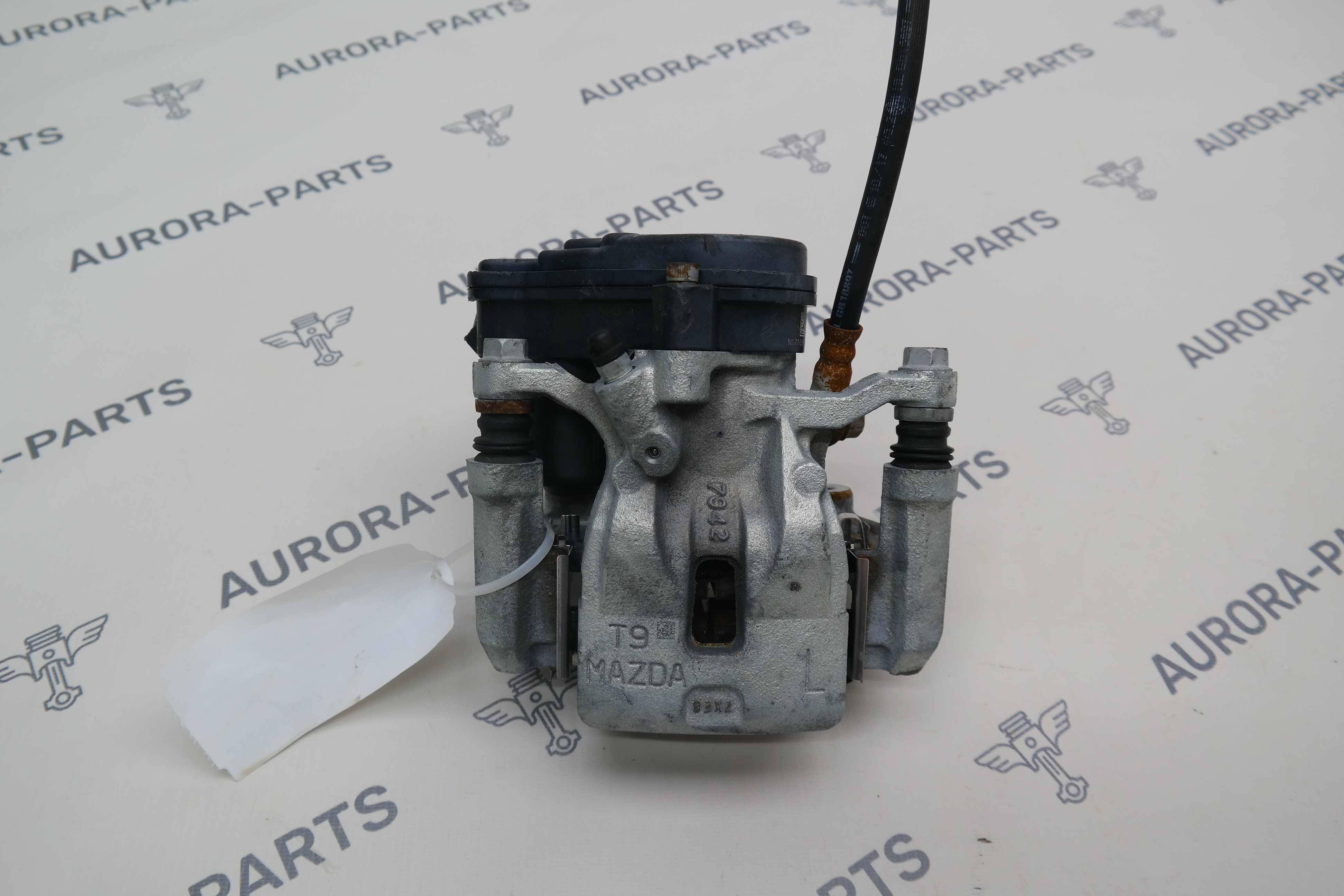 Суппорт тормозной задний в сборе LH Mazda CX-5