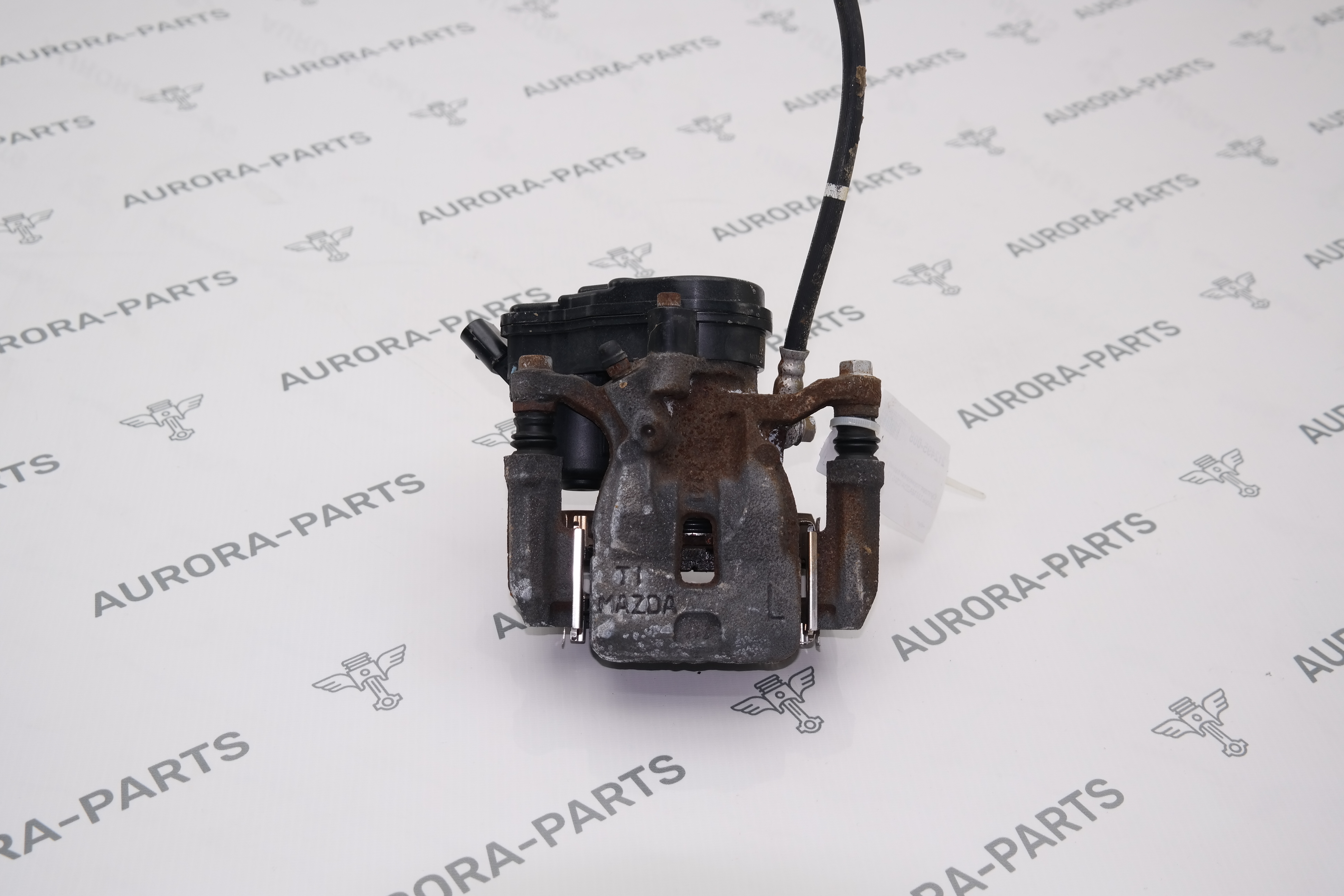 Суппорт тормозной задний в сборе LH Mazda CX-5