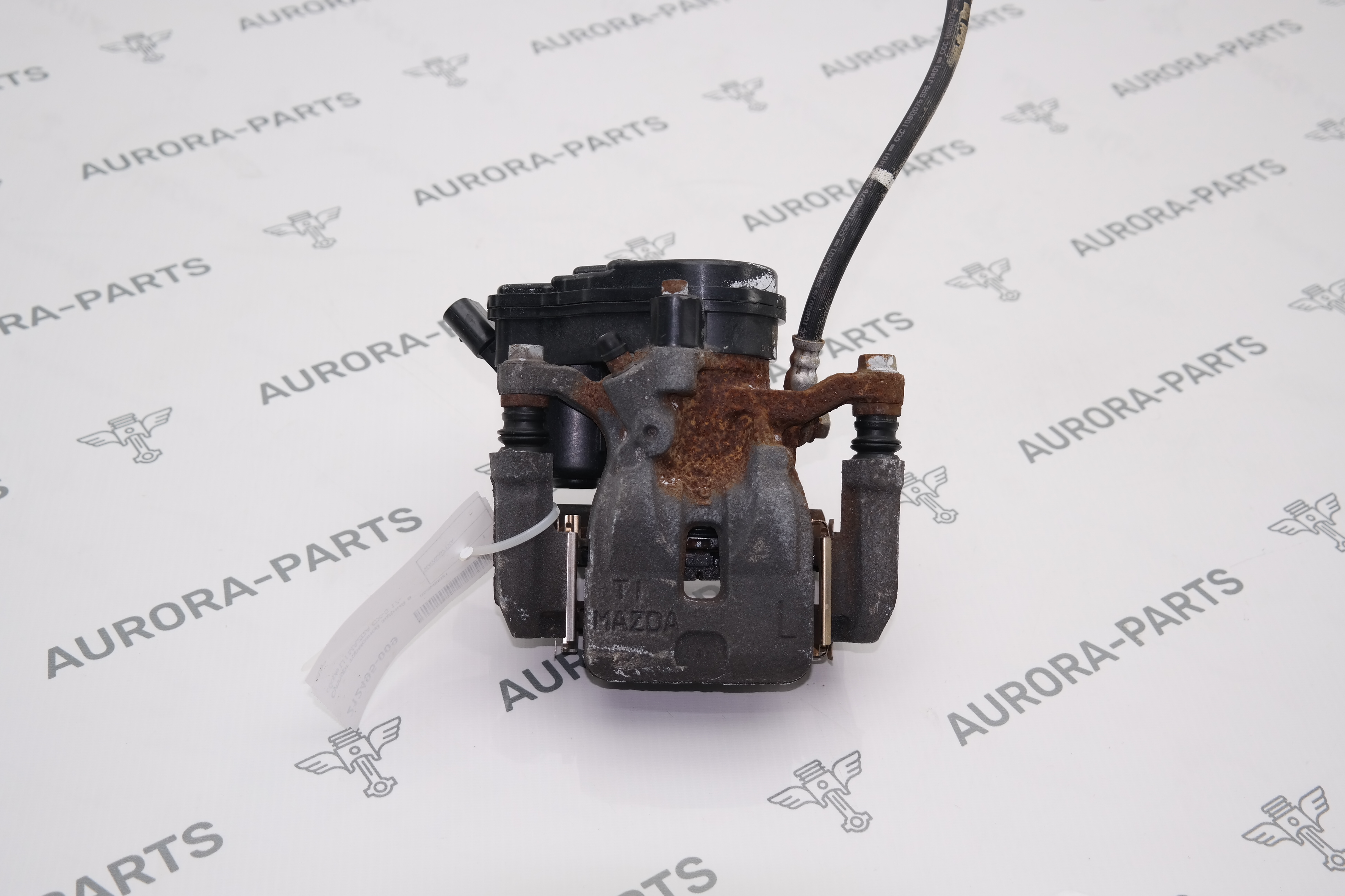 Суппорт тормозной задний в сборе LH Mazda CX-5