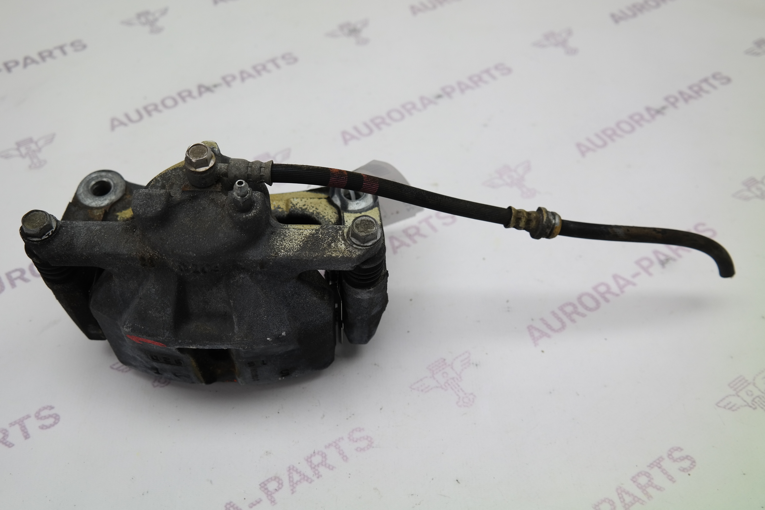 Суппорт тормозной передний LH Mazda CX-5