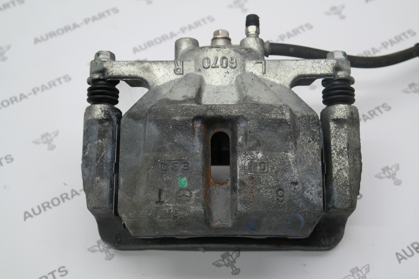 Суппорт тормозной передний LH Mazda CX-5