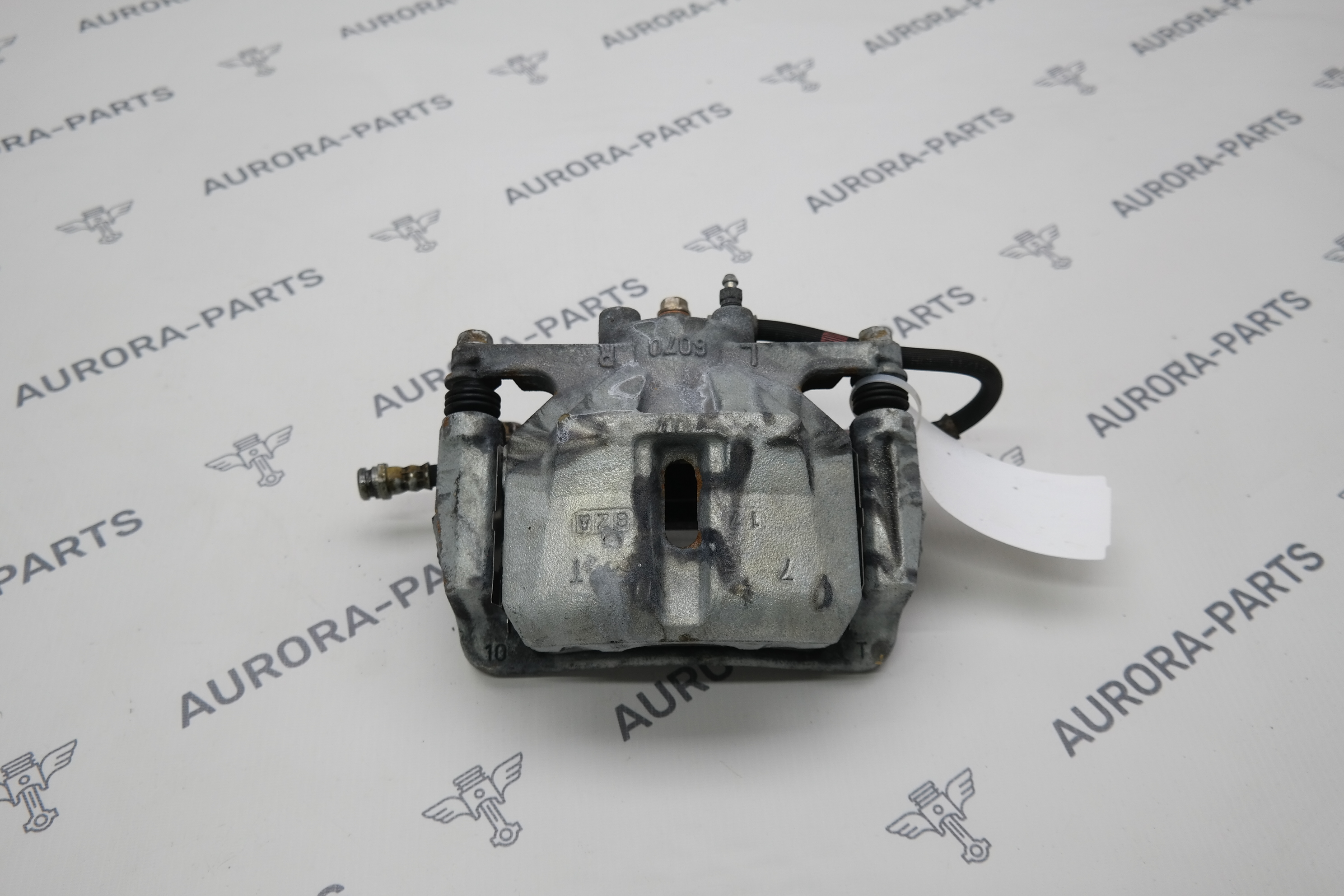 Суппорт тормозной передний LH Mazda CX-5