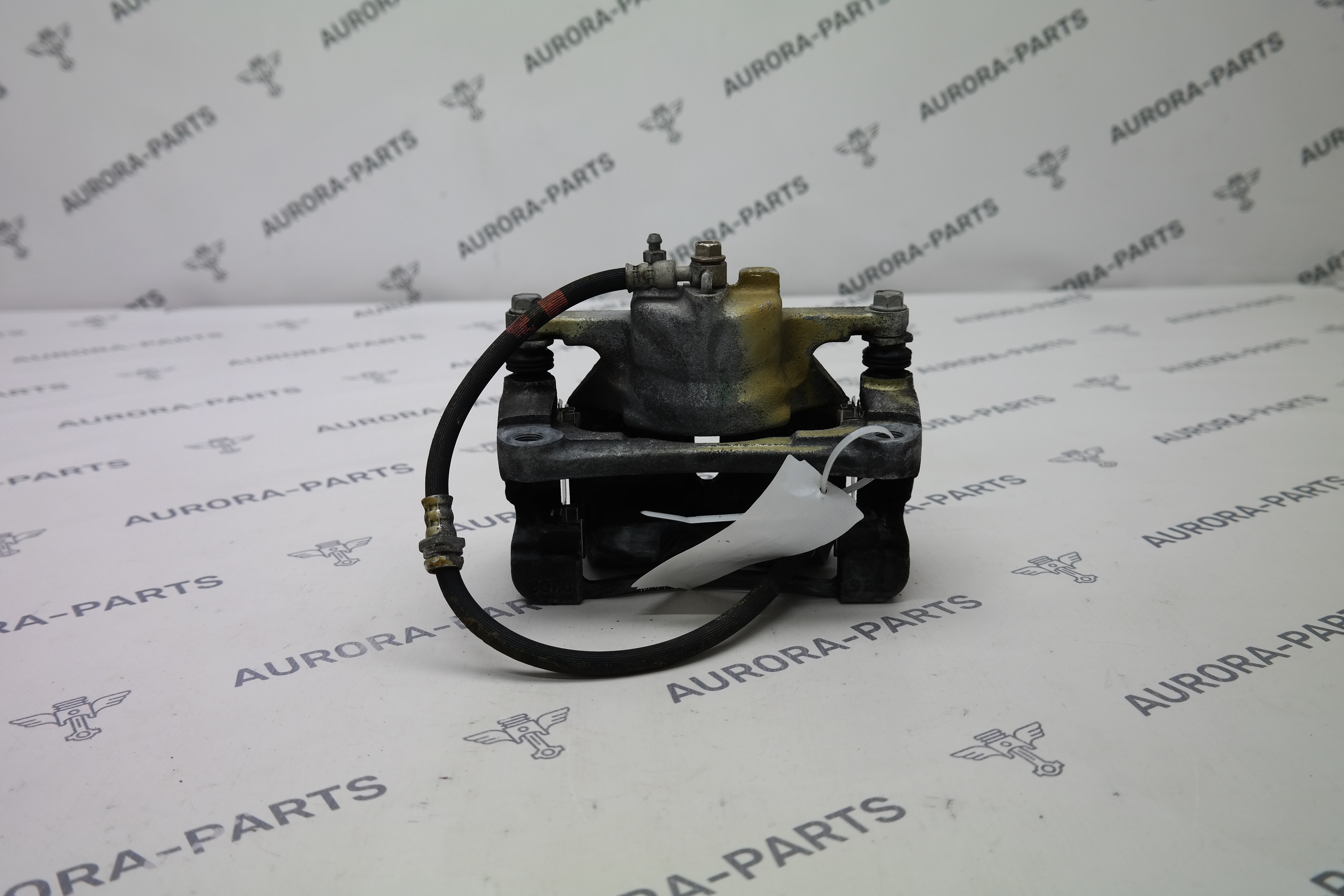 Суппорт тормозной передний LH Mazda CX-5