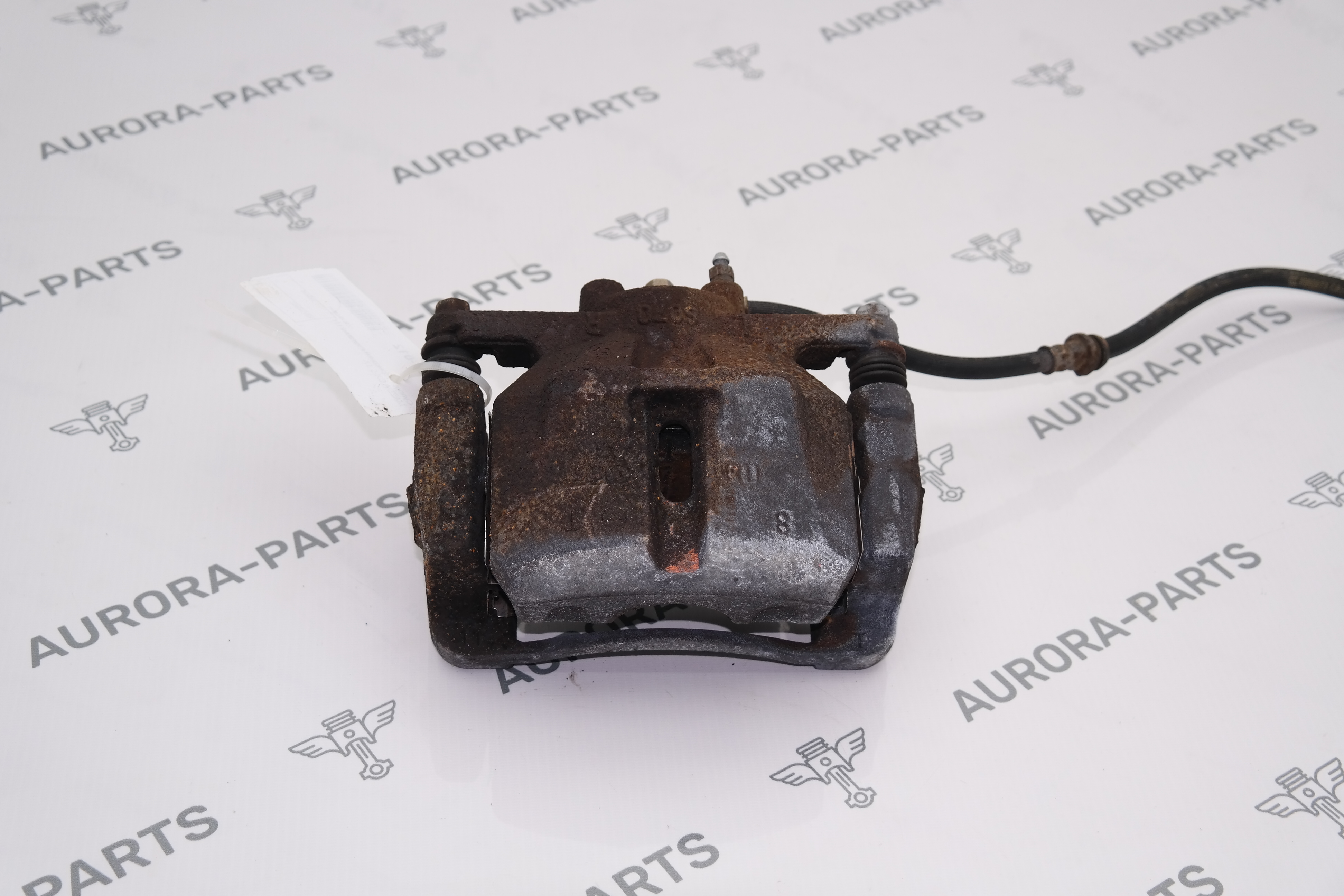 Суппорт тормозной передний LH Mazda CX-5