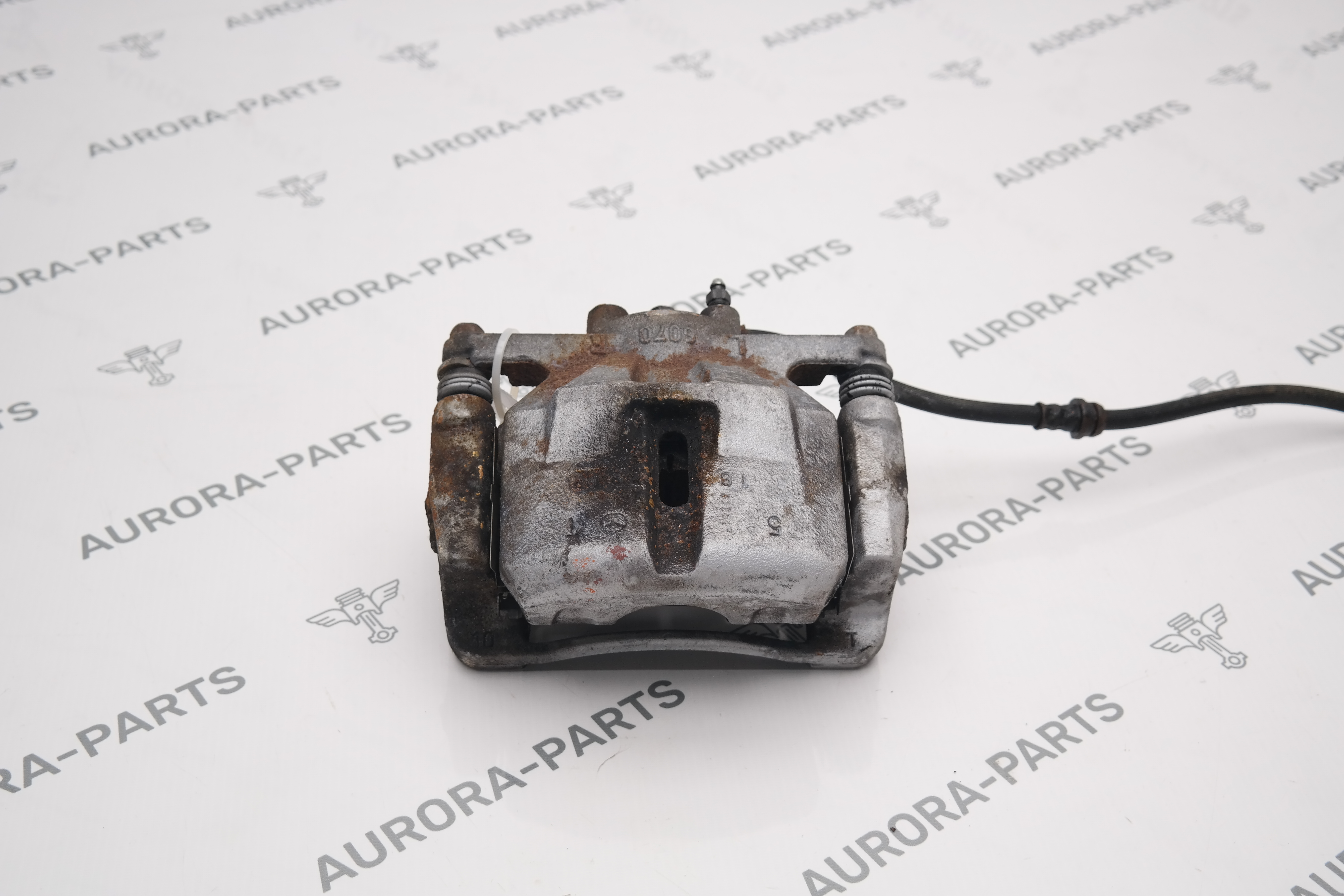 Суппорт тормозной передний LH Mazda CX-5