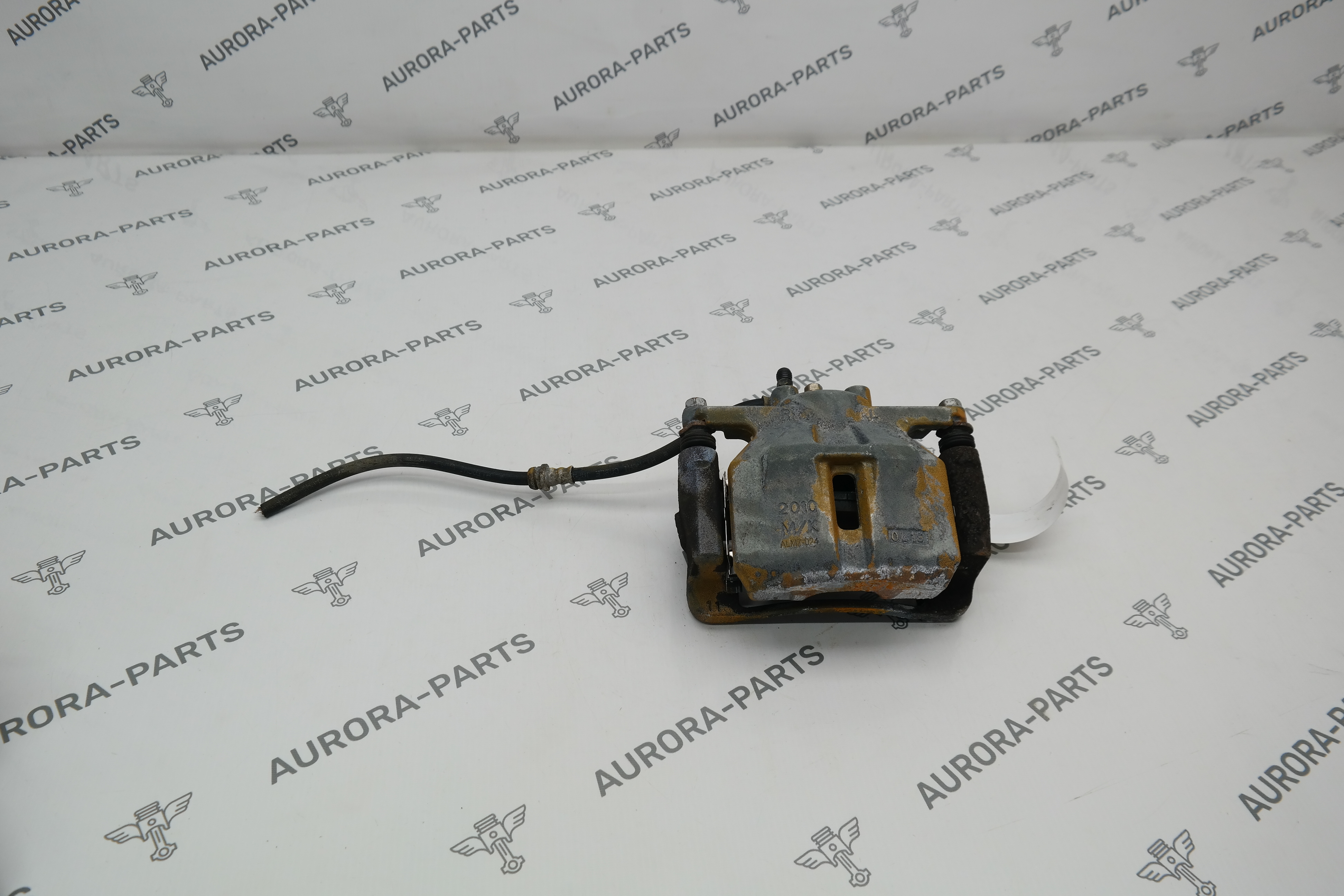 Суппорт тормозной передний RH Mazda CX-5