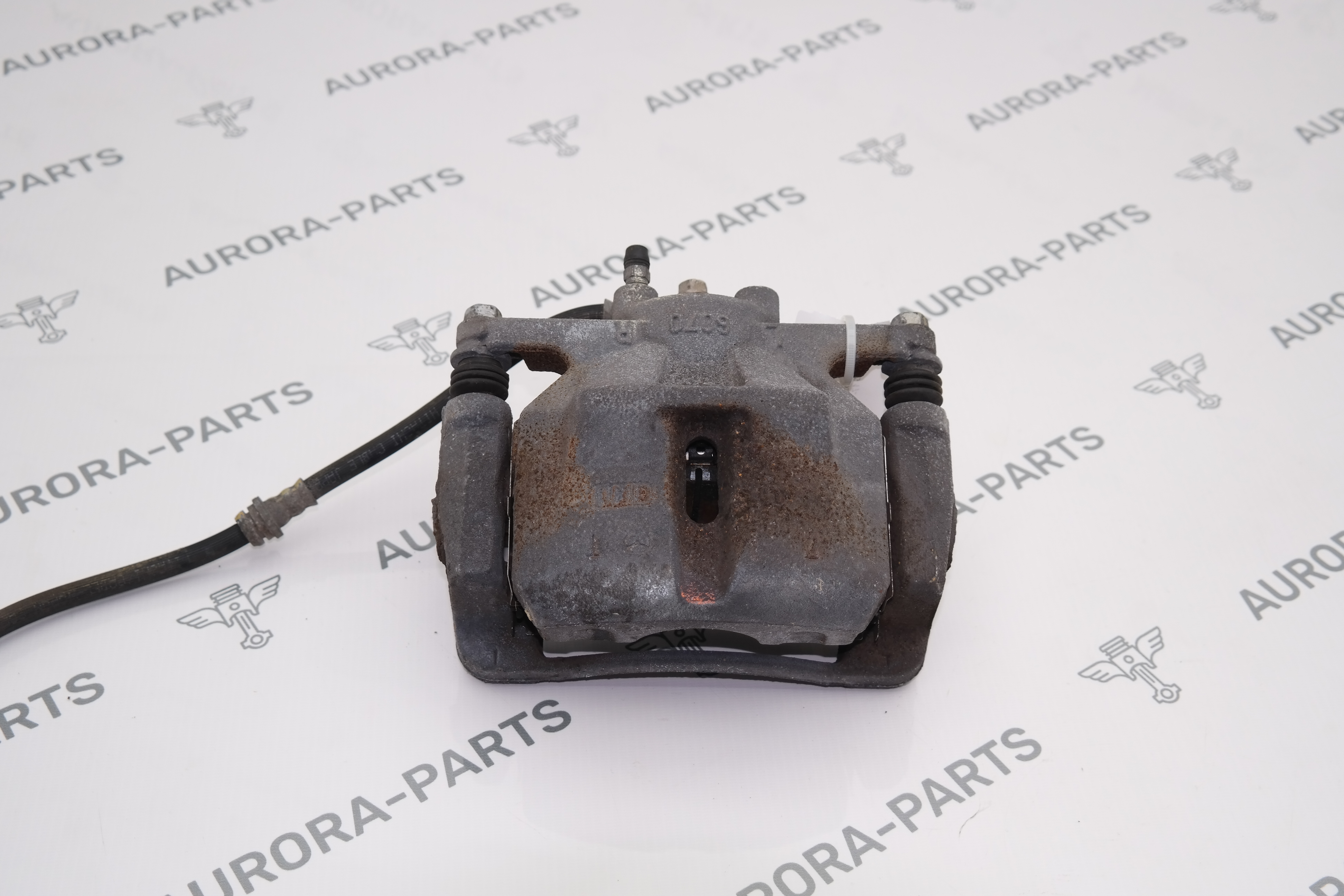 Суппорт тормозной передний RH Mazda CX-5