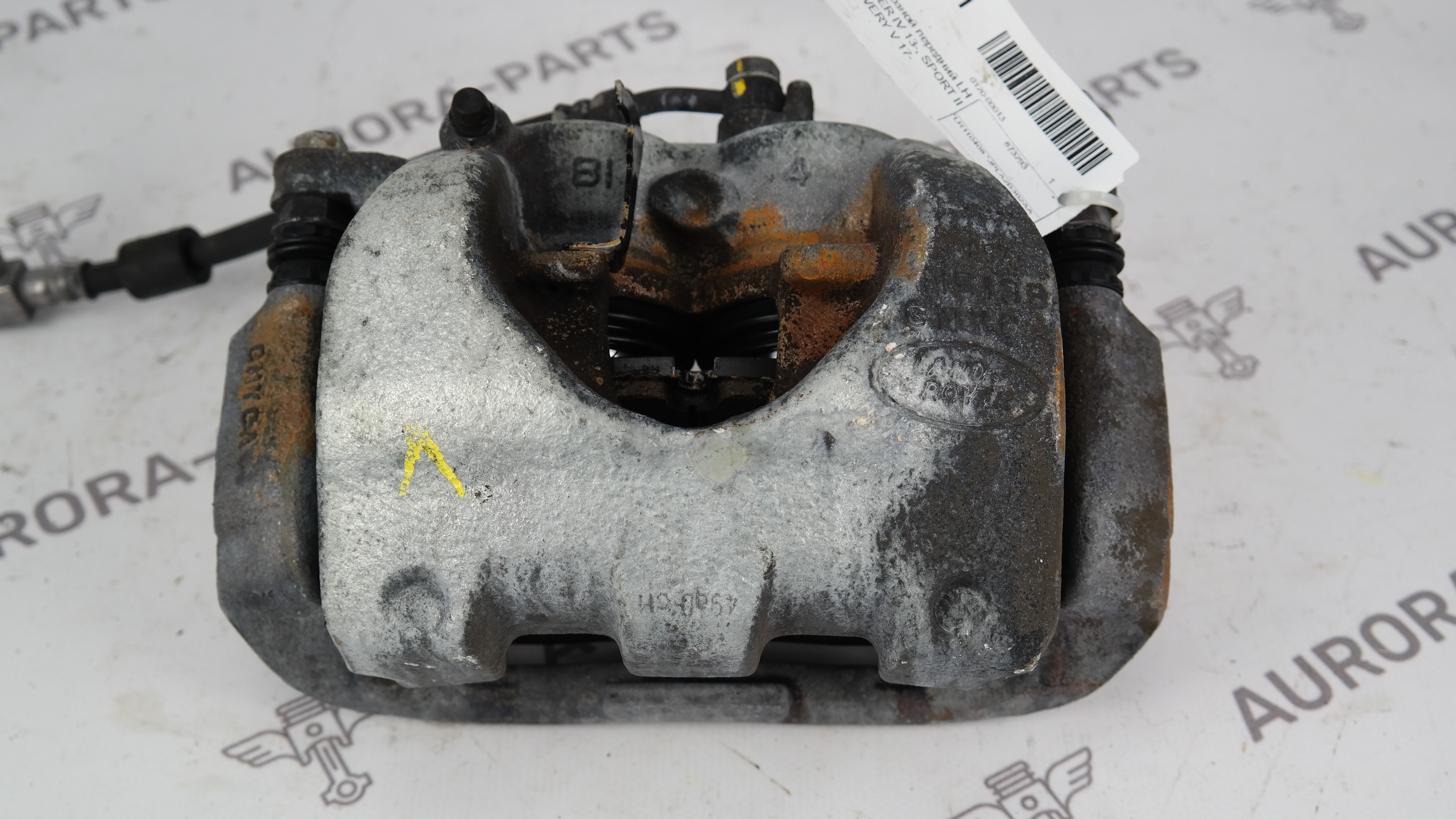 Суппорт тормозной передний LH Land Rover Discovery