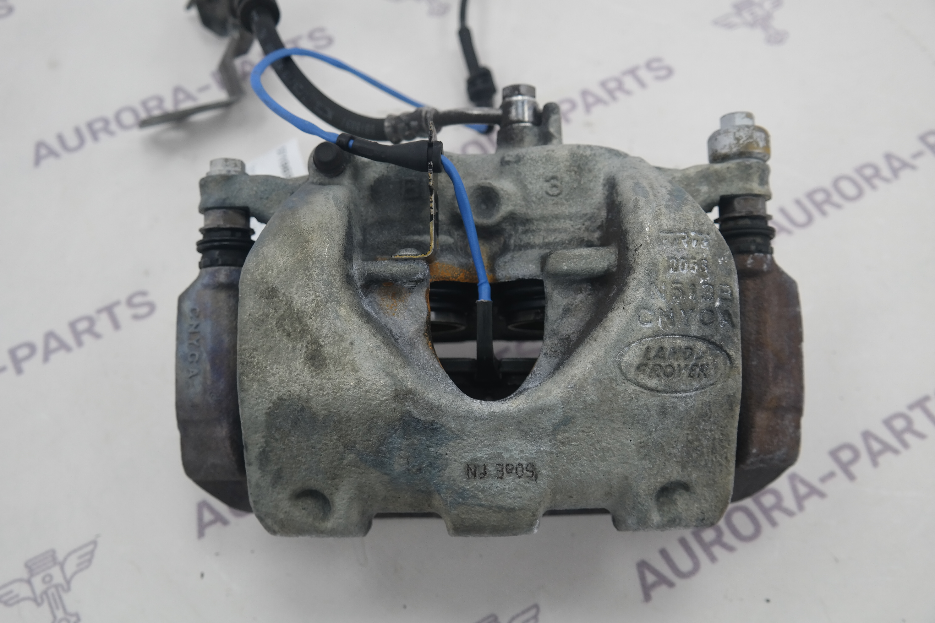 Суппорт тормозной передний LH Land Rover Discovery