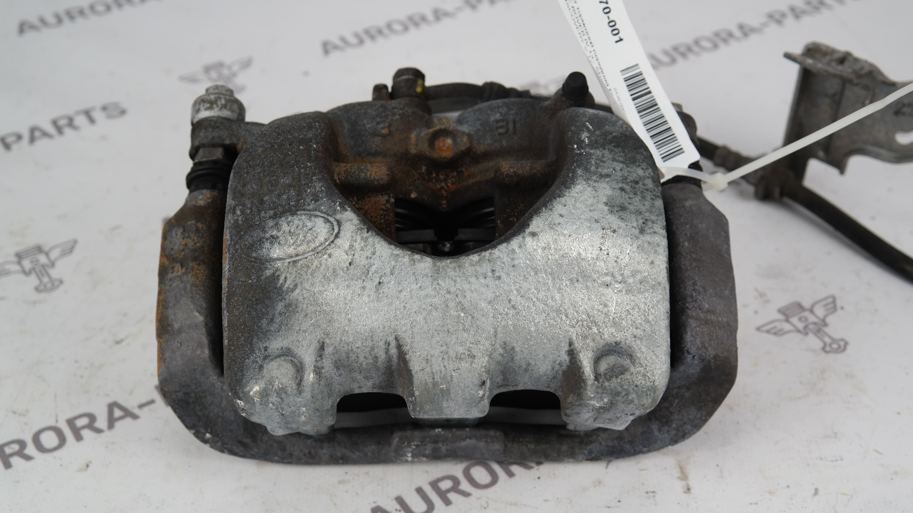 Суппорт тормозной передний RH Land Rover Discovery