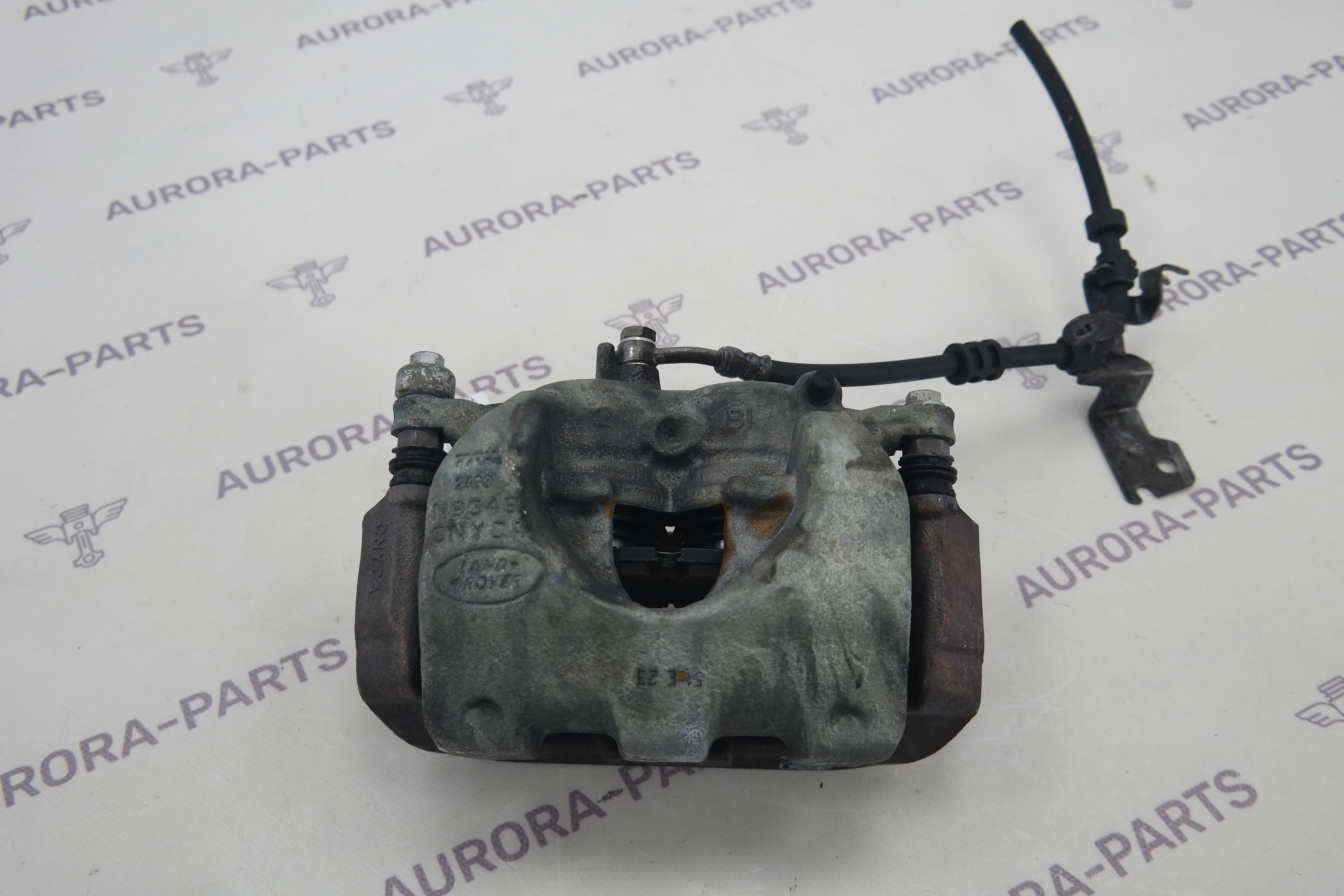 Суппорт тормозной передний RH Land Rover Discovery