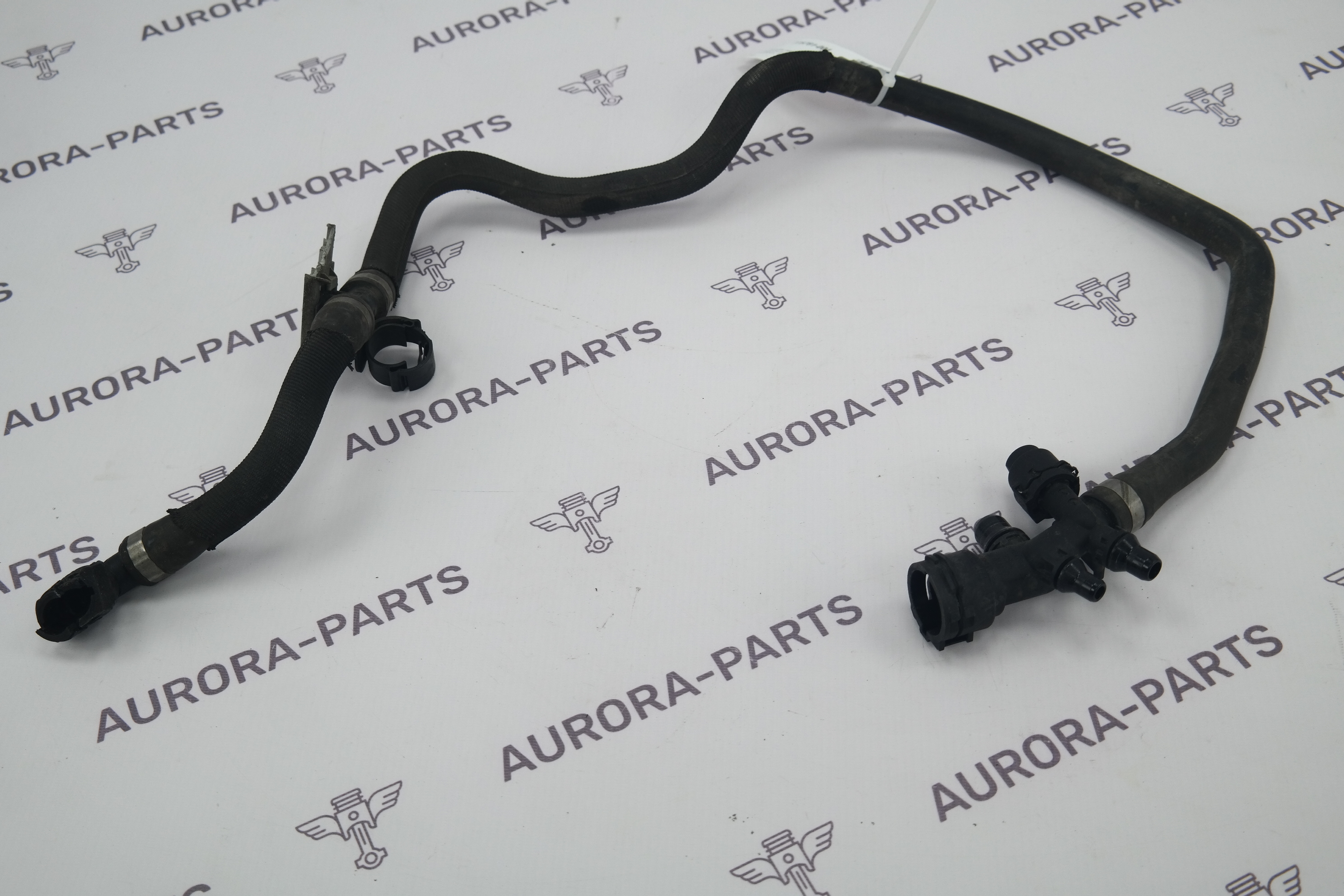 Патрубок охлаждающей жидкости от бачка к насосу BMW X5