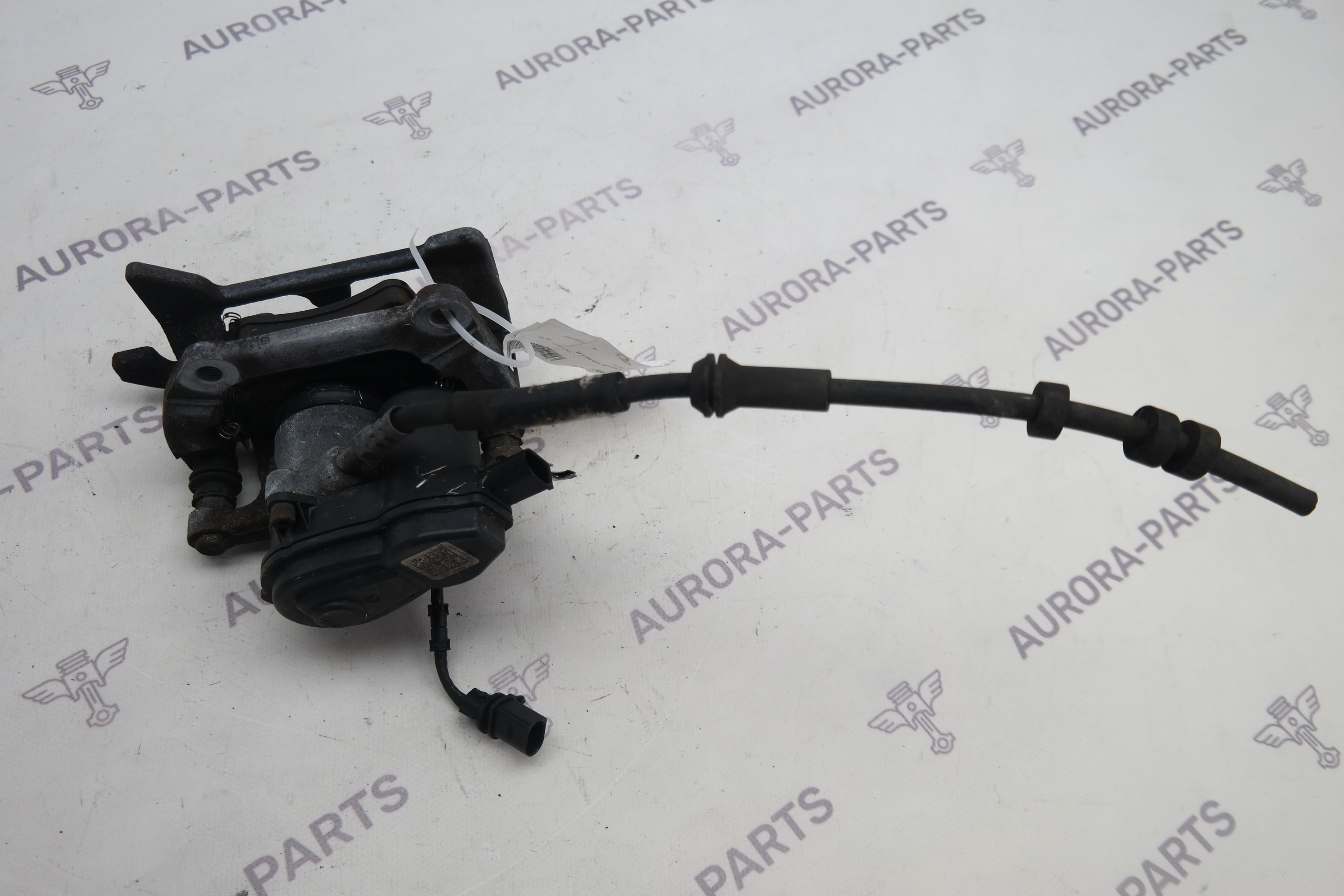 Суппорт тормозной задний LH Audi A6