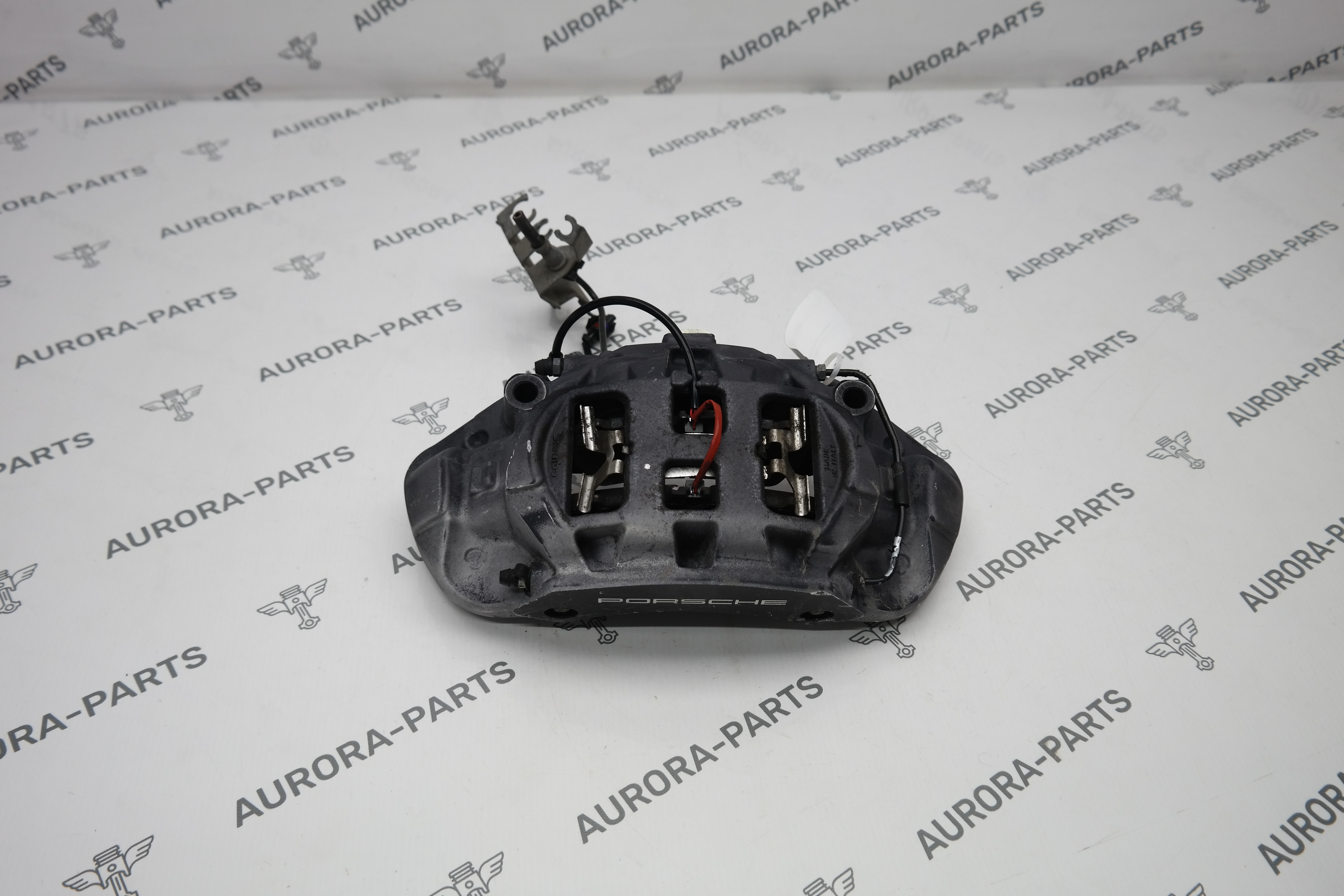 Суппорт тормозной передний в сборе LH Porsche Cayenne