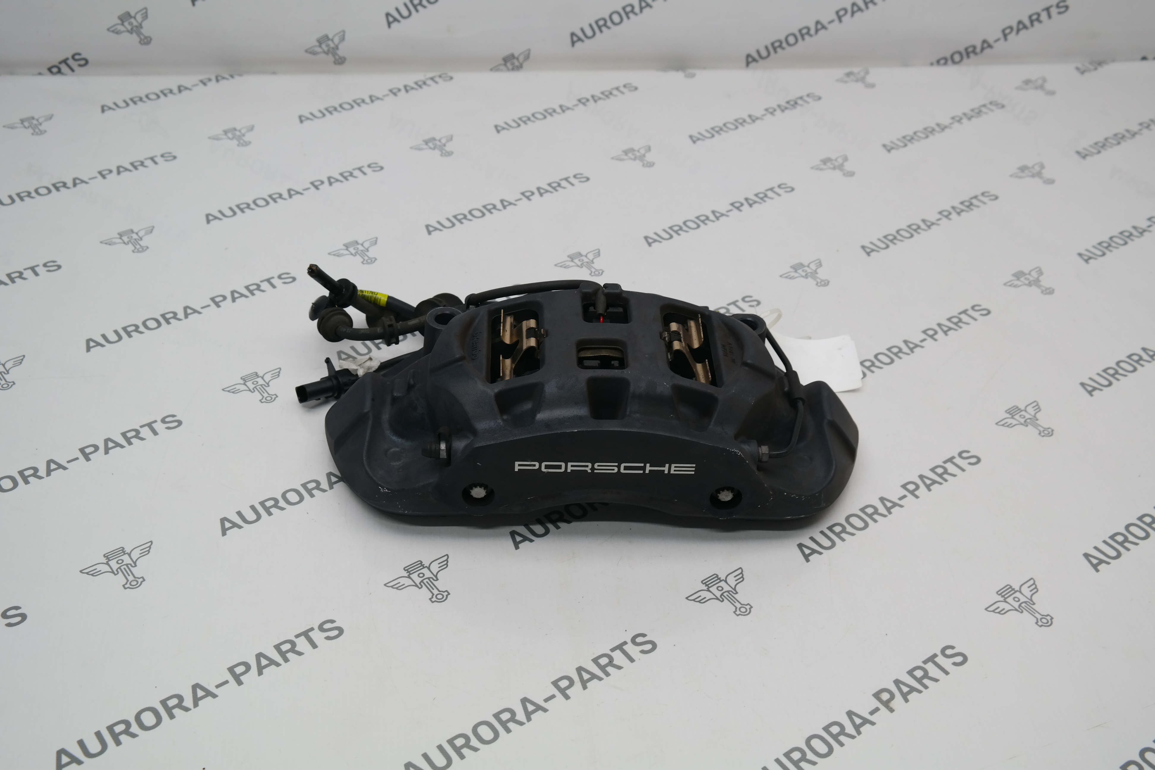 Суппорт тормозной передний в сборе LH Porsche Cayenne