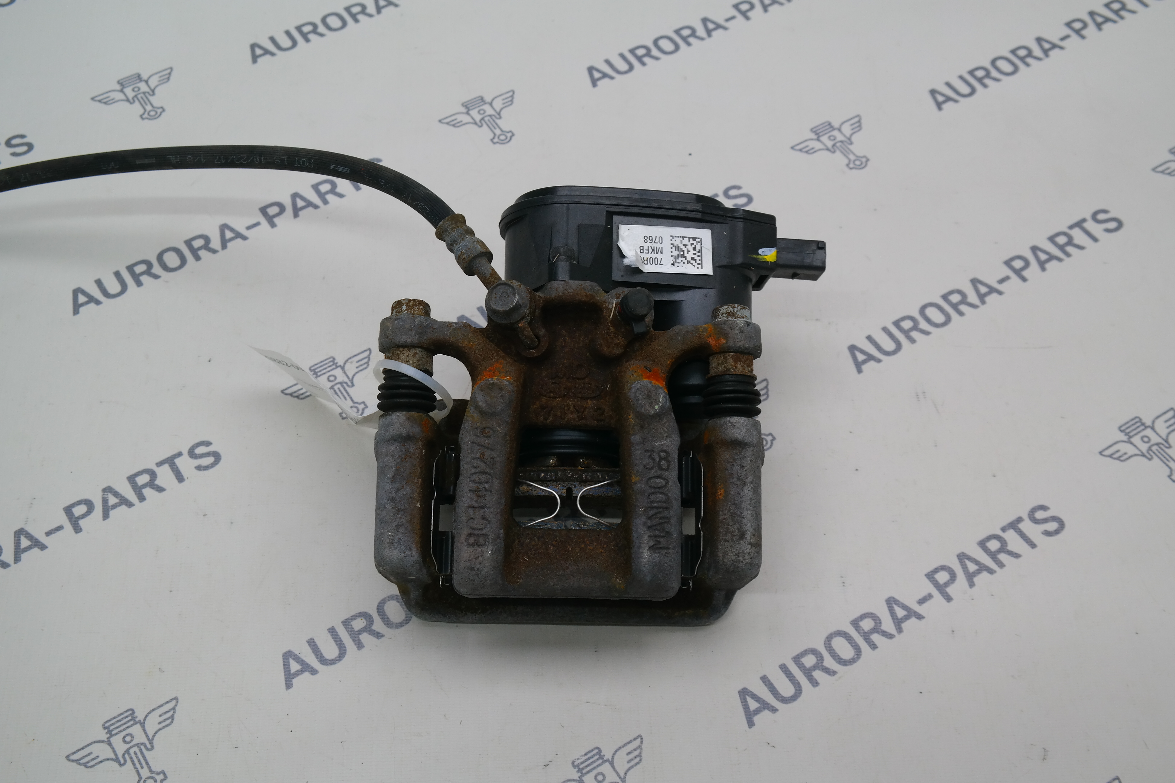 Суппорт тормозной задний RH Hyundai Tucson