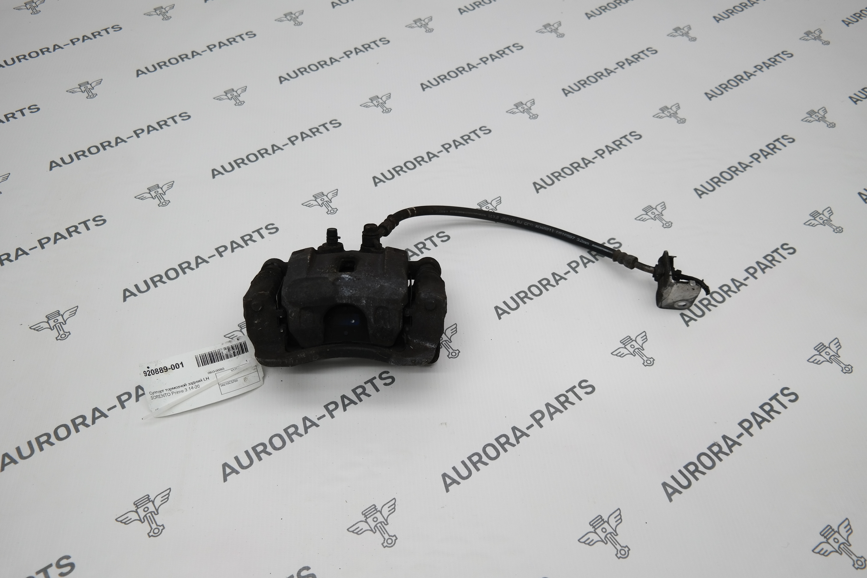 Суппорт тормозной задний LH Kia Sorento