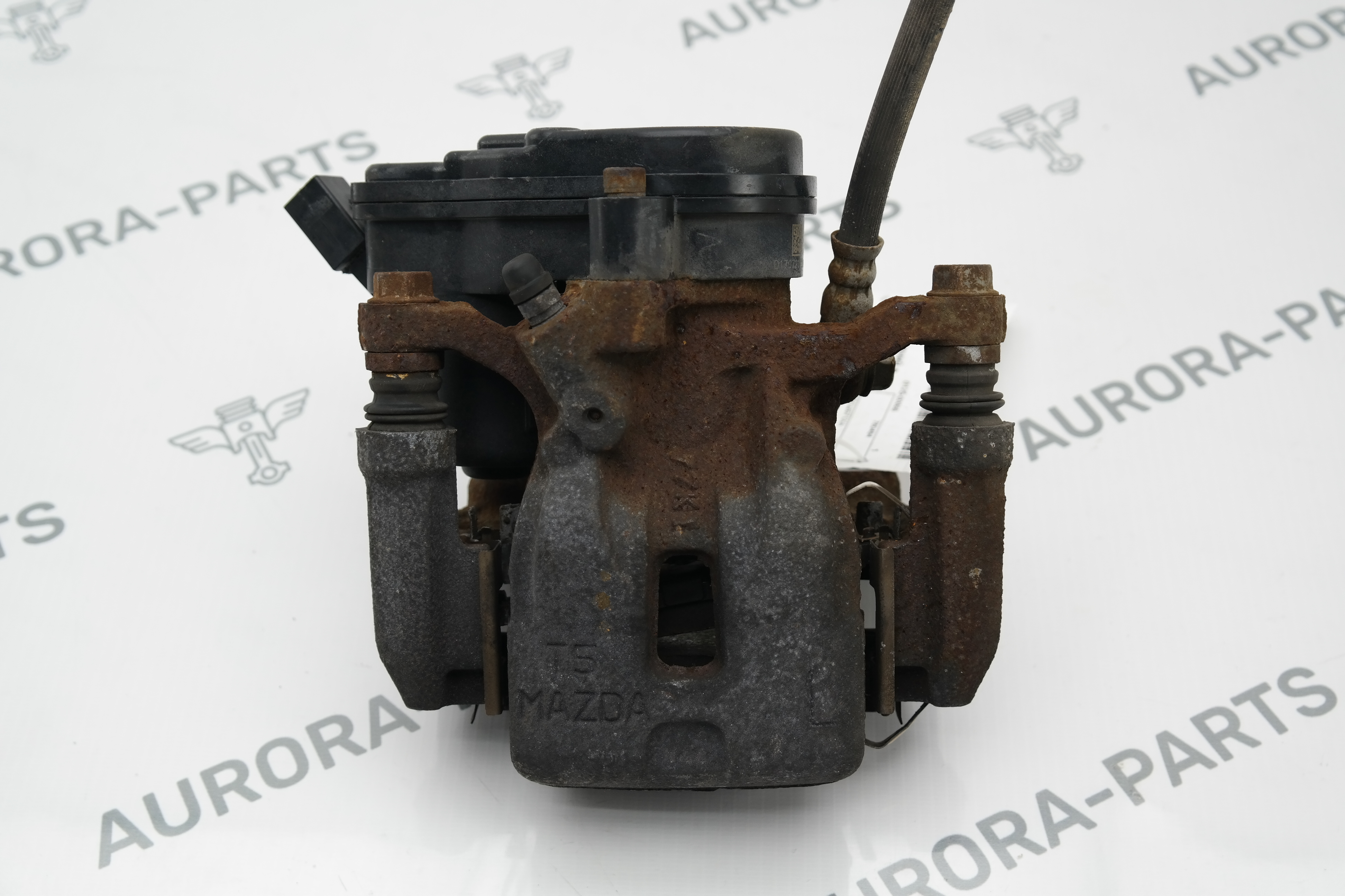 Суппорт тормозной задний в сборе (Дефект фишки) LH Mazda CX-5