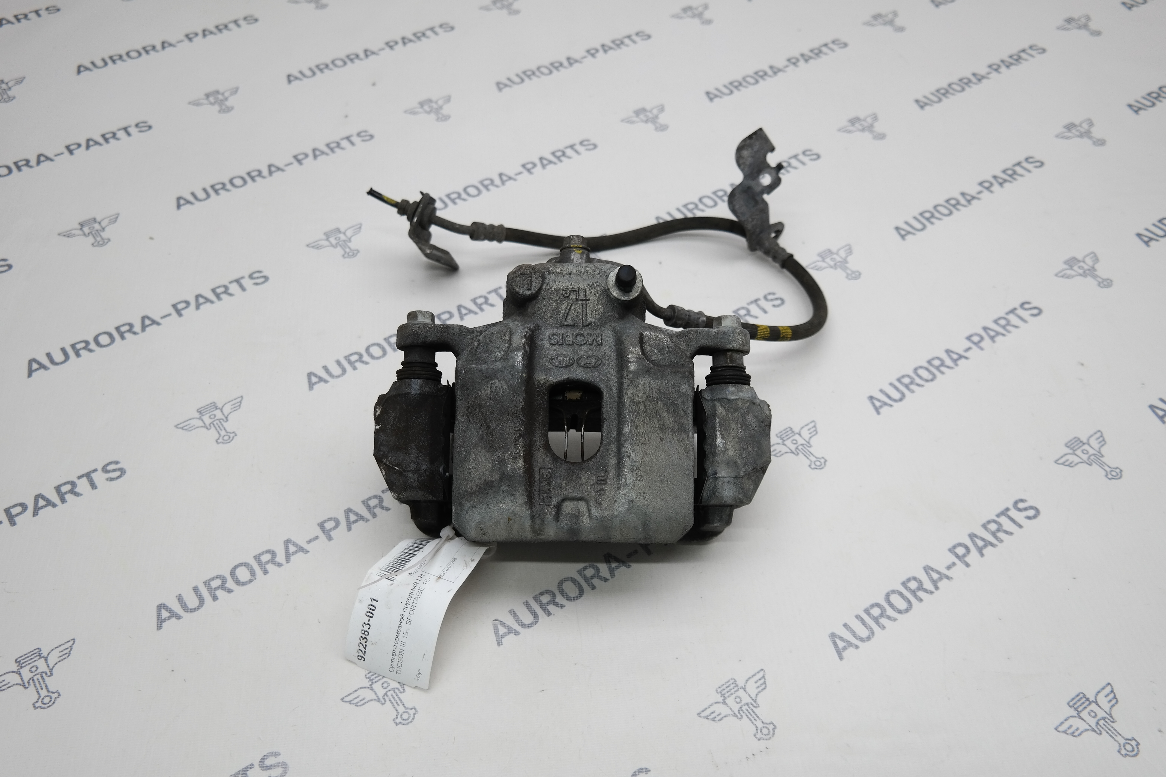 Суппорт тормозной передний LH Hyundai Tucson