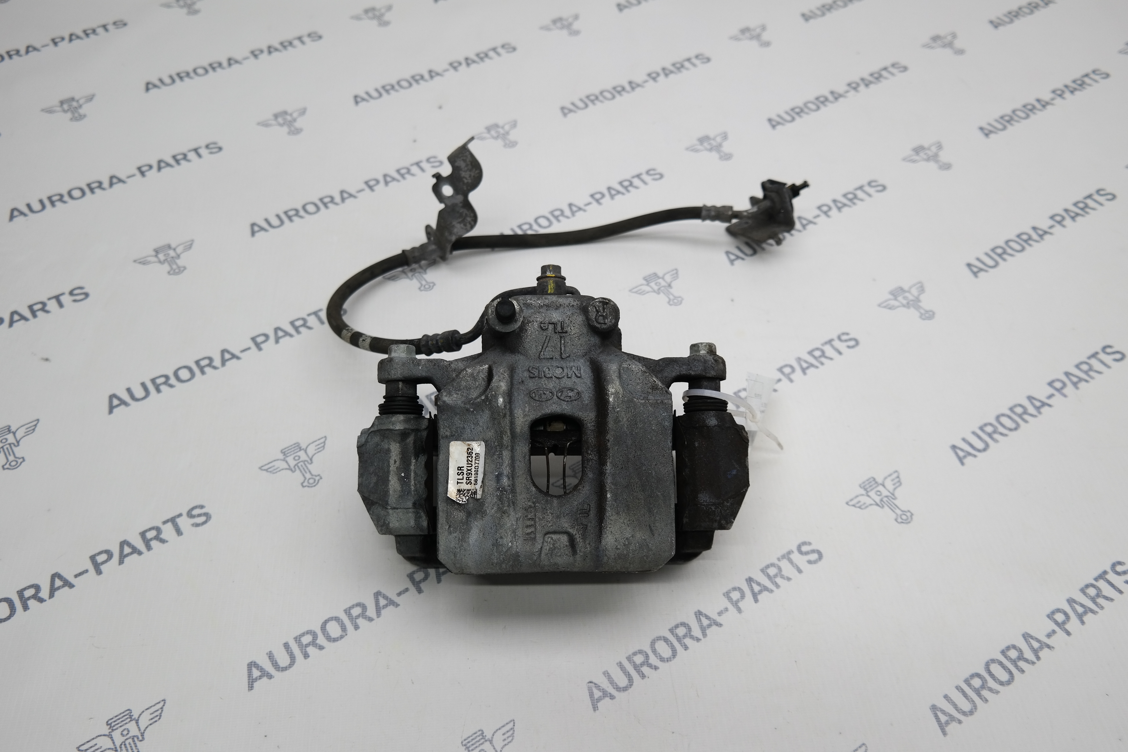 Суппорт тормозной передний RH Hyundai Tucson