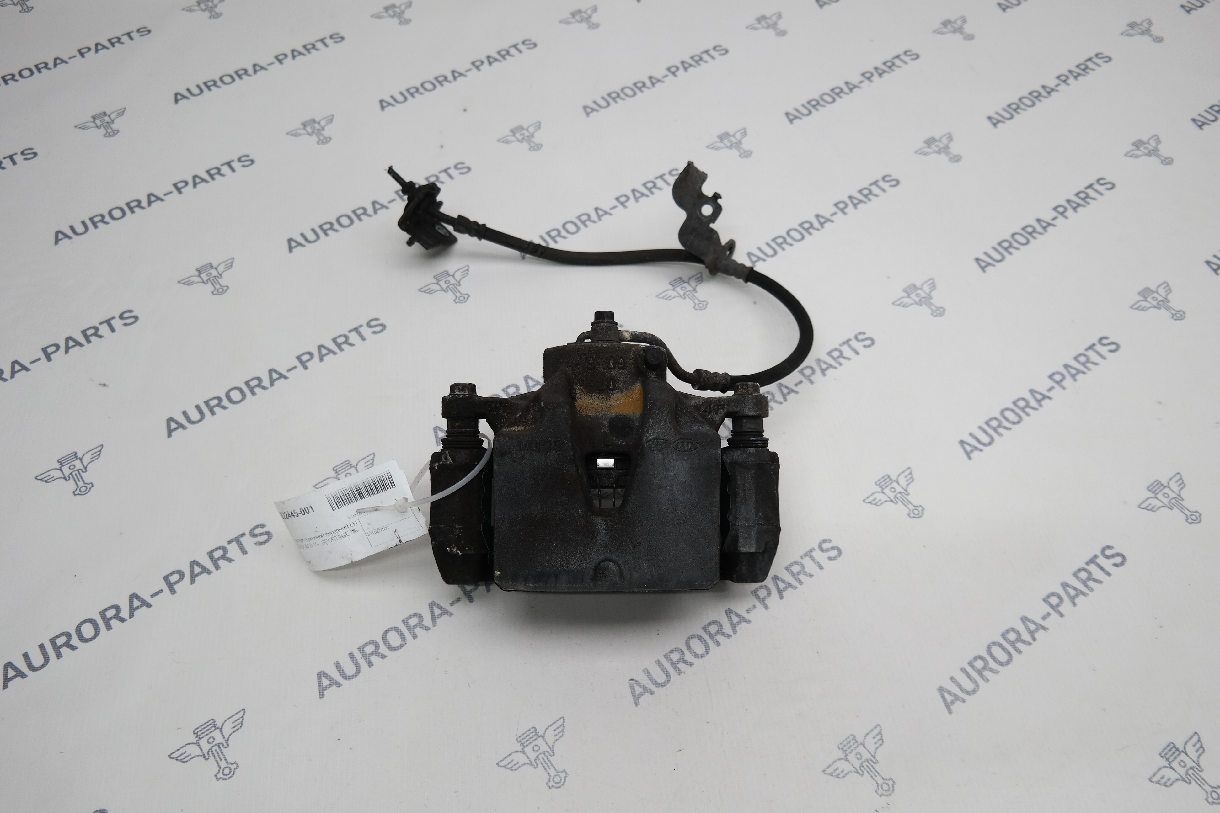 Суппорт тормозной передний LH Kia Sportage