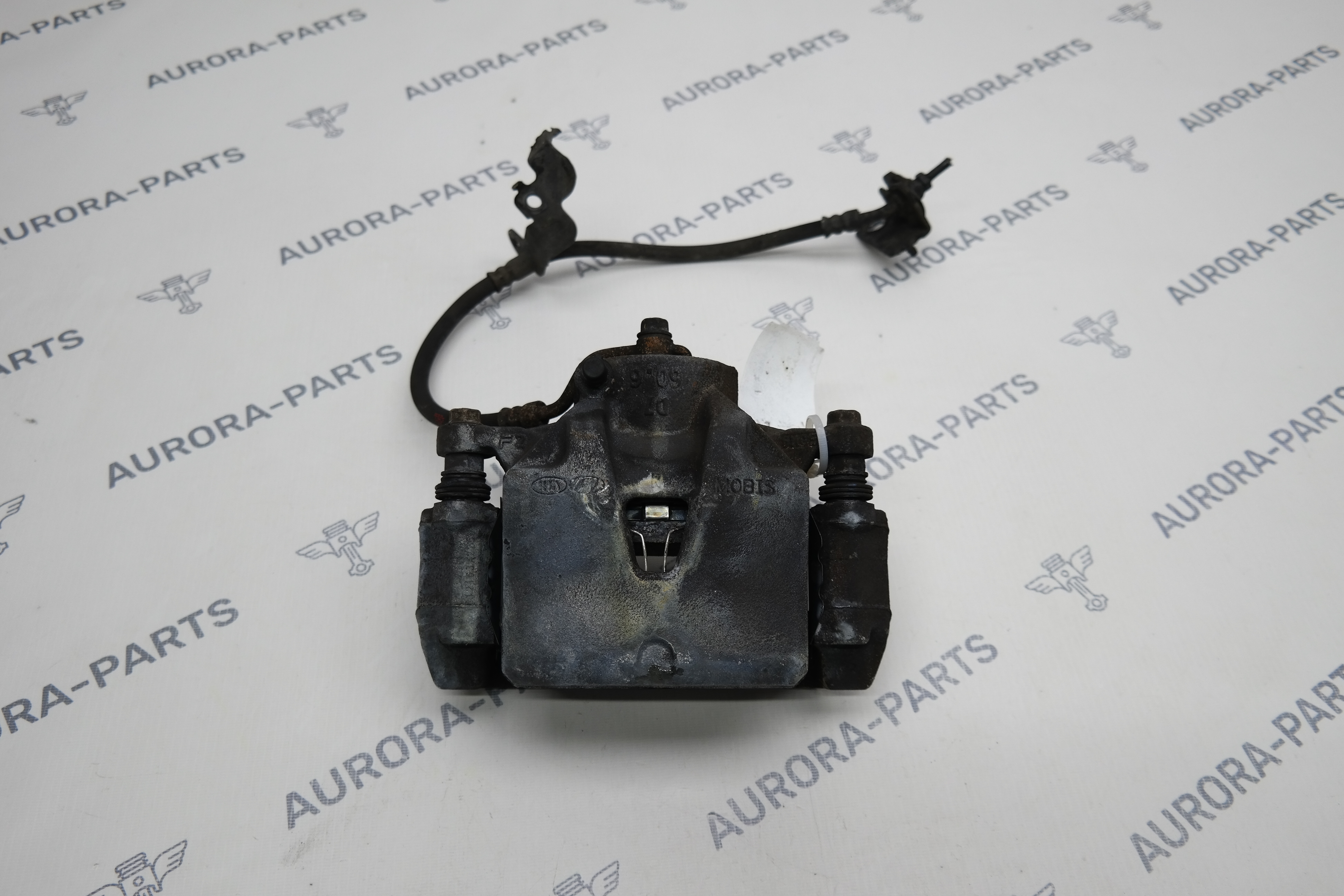 Суппорт тормозной передний RH Kia Sportage