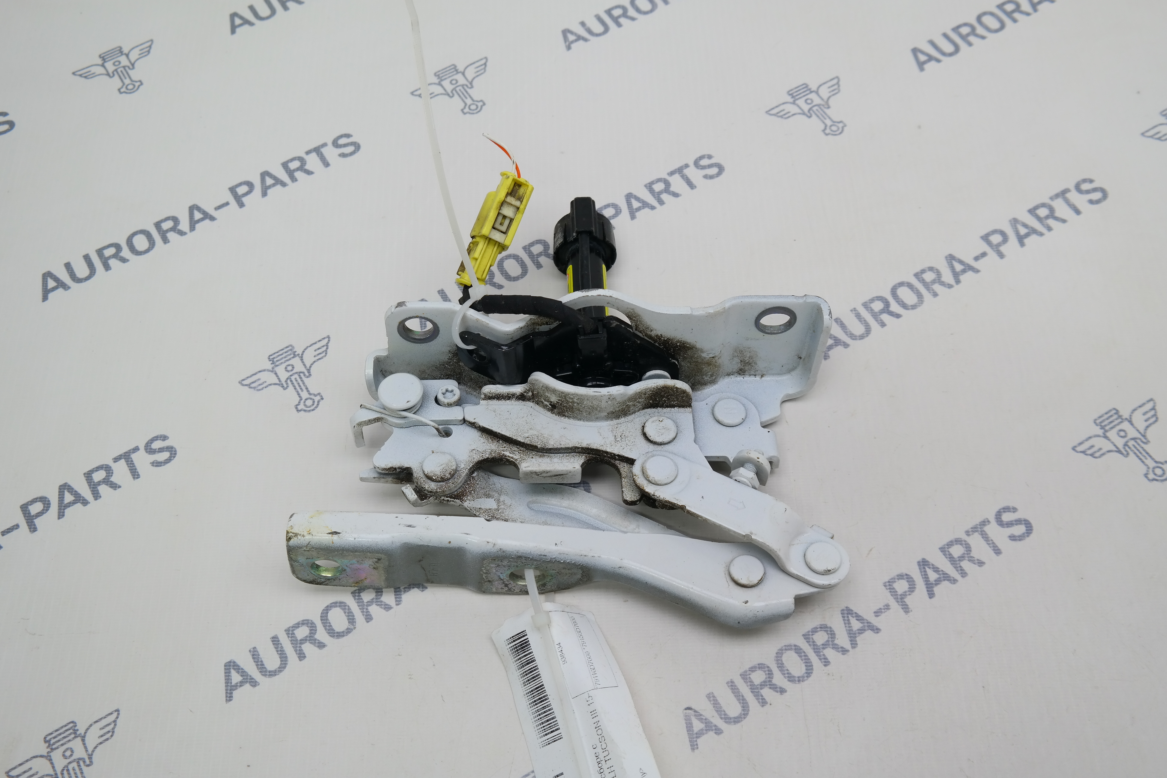 Петля капота в сборе с пиропатроном LH Hyundai Tucson