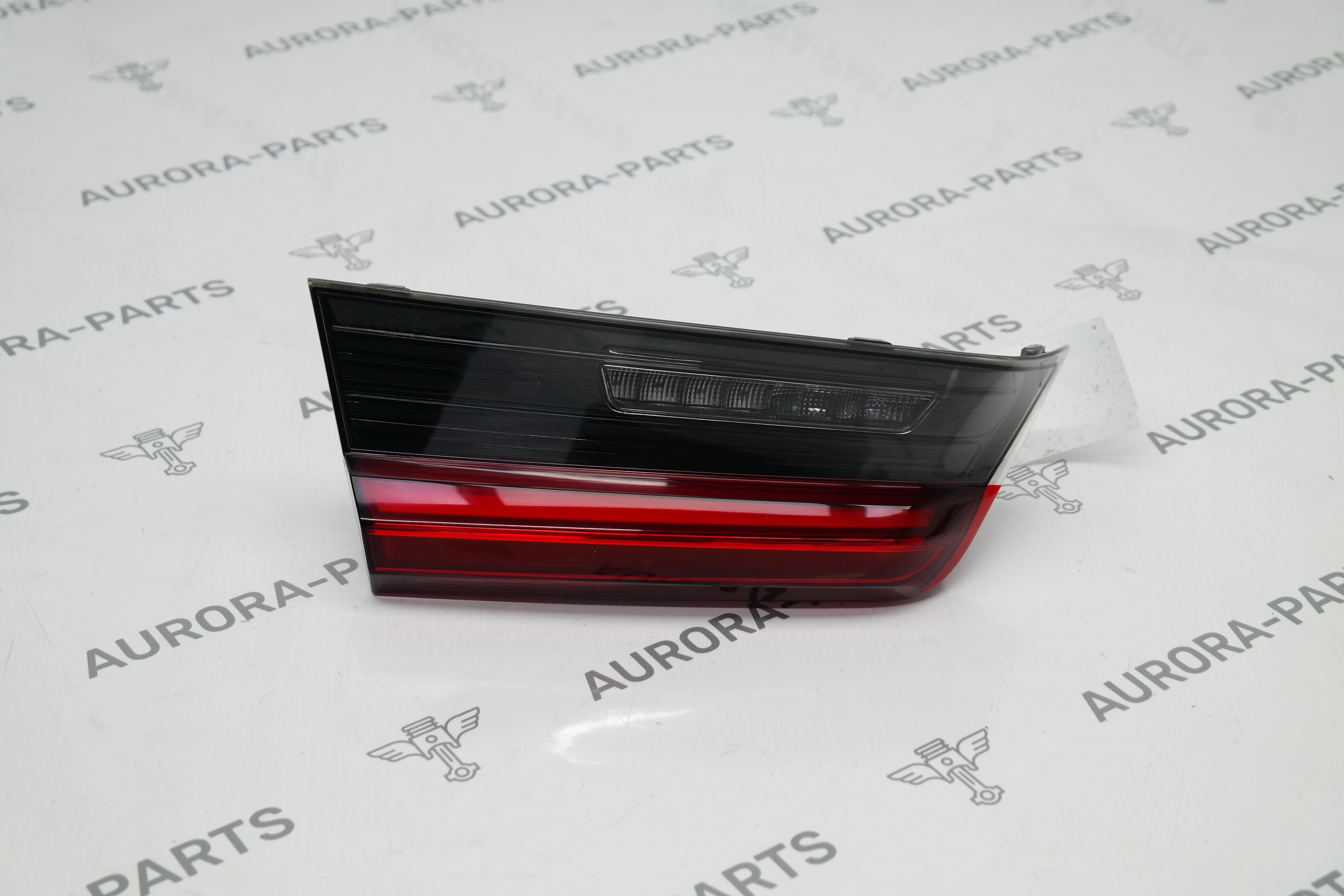 Фонарь задний LH в крышку багажника BMW 3-Series