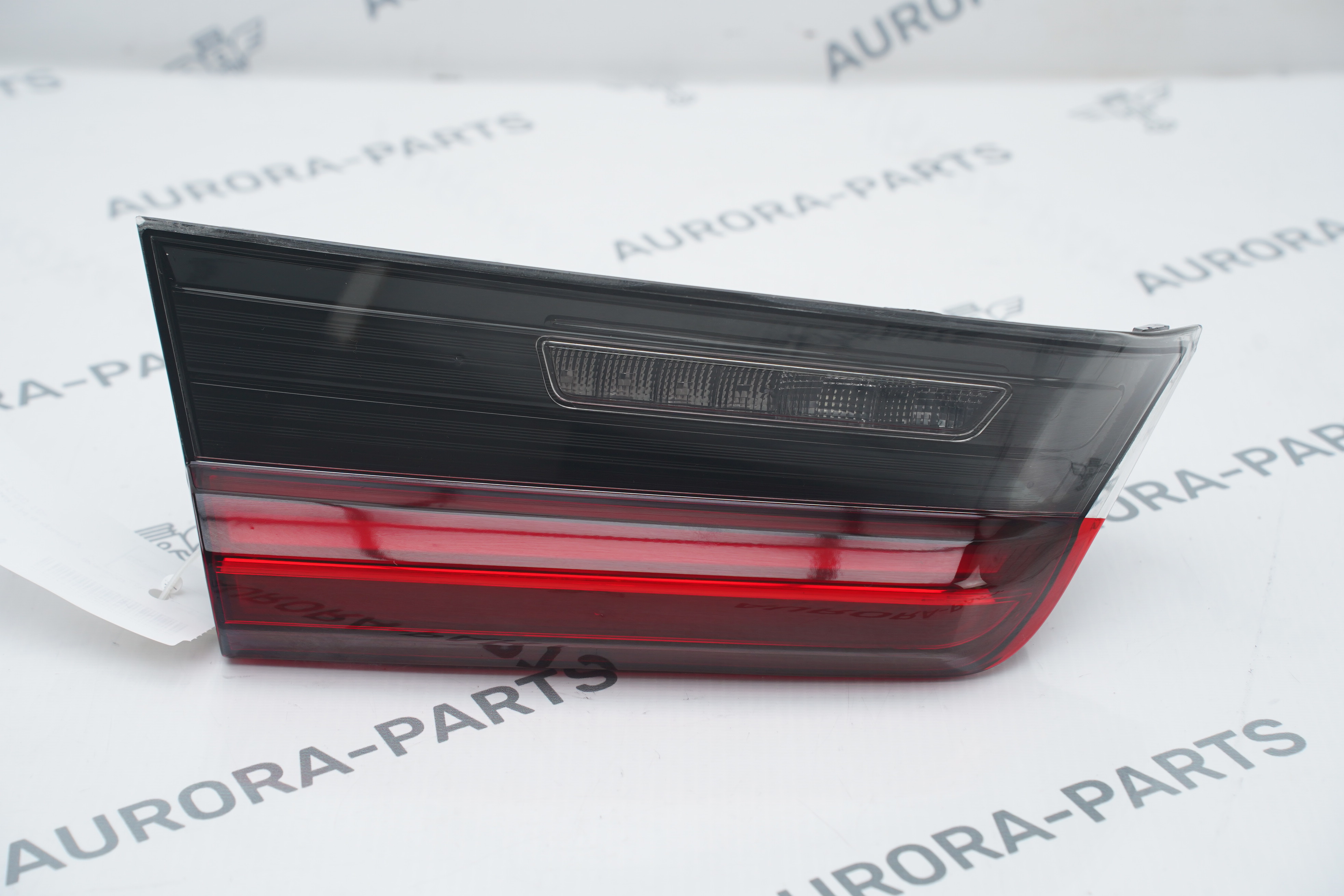 Фонарь задний LH в крышку багажника BMW 3-Series