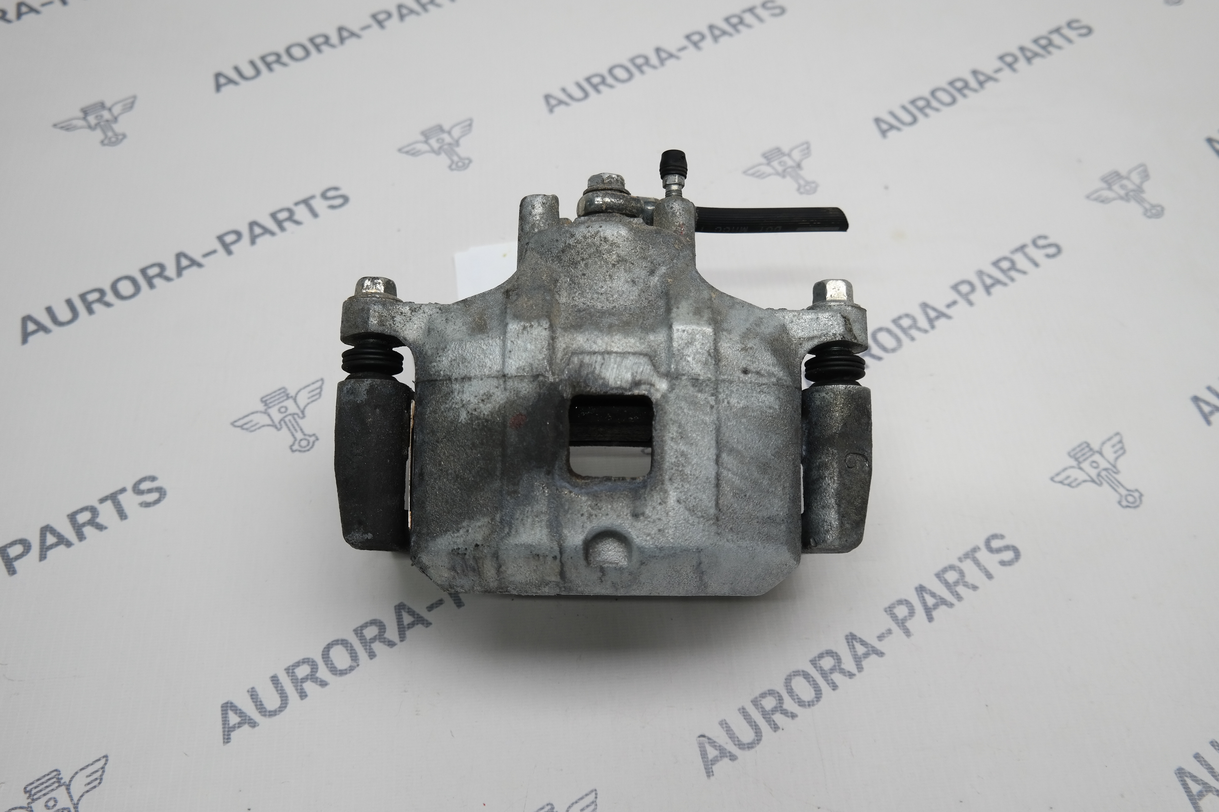 Суппорт тормозной передний LH Mitsubishi Outlander