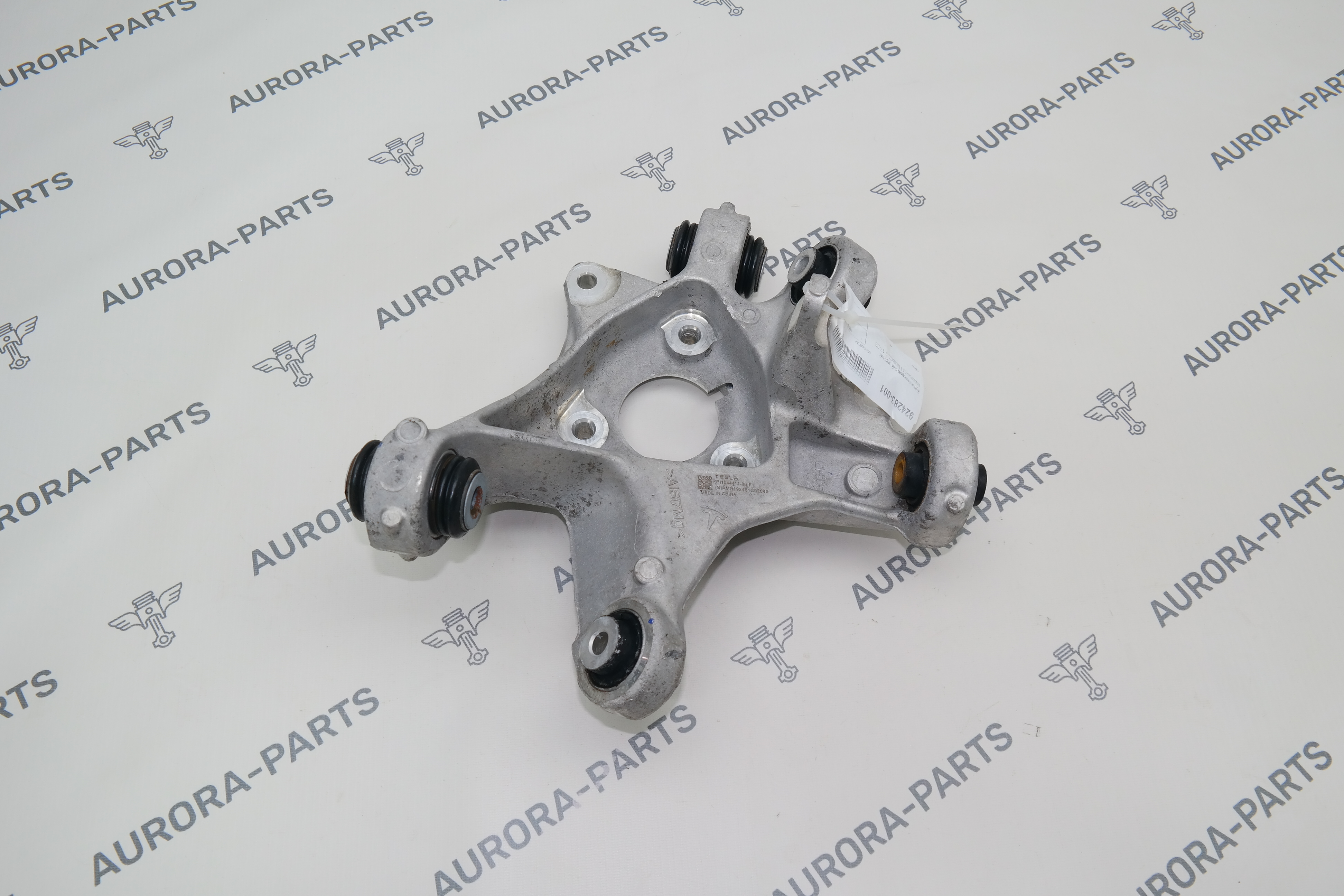 Кулак поворотный задней подвески LH Tesla Model 3