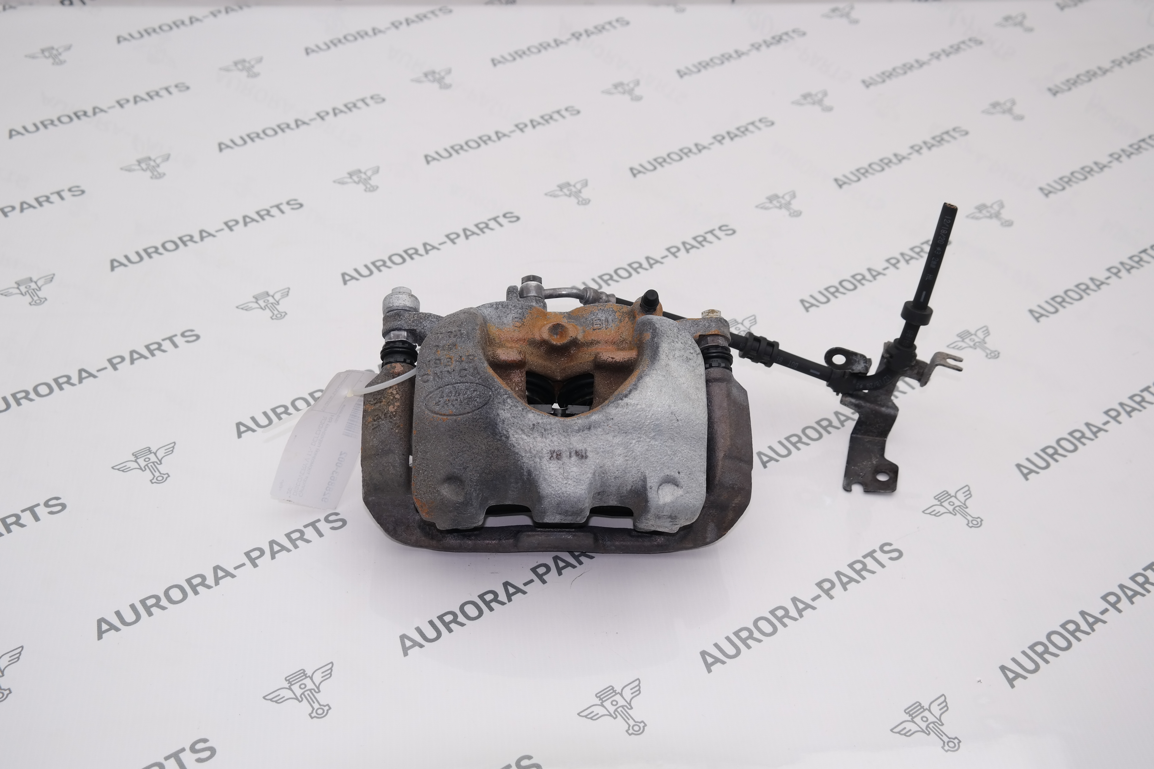 Суппорт тормозной передний RH Land Rover Defender