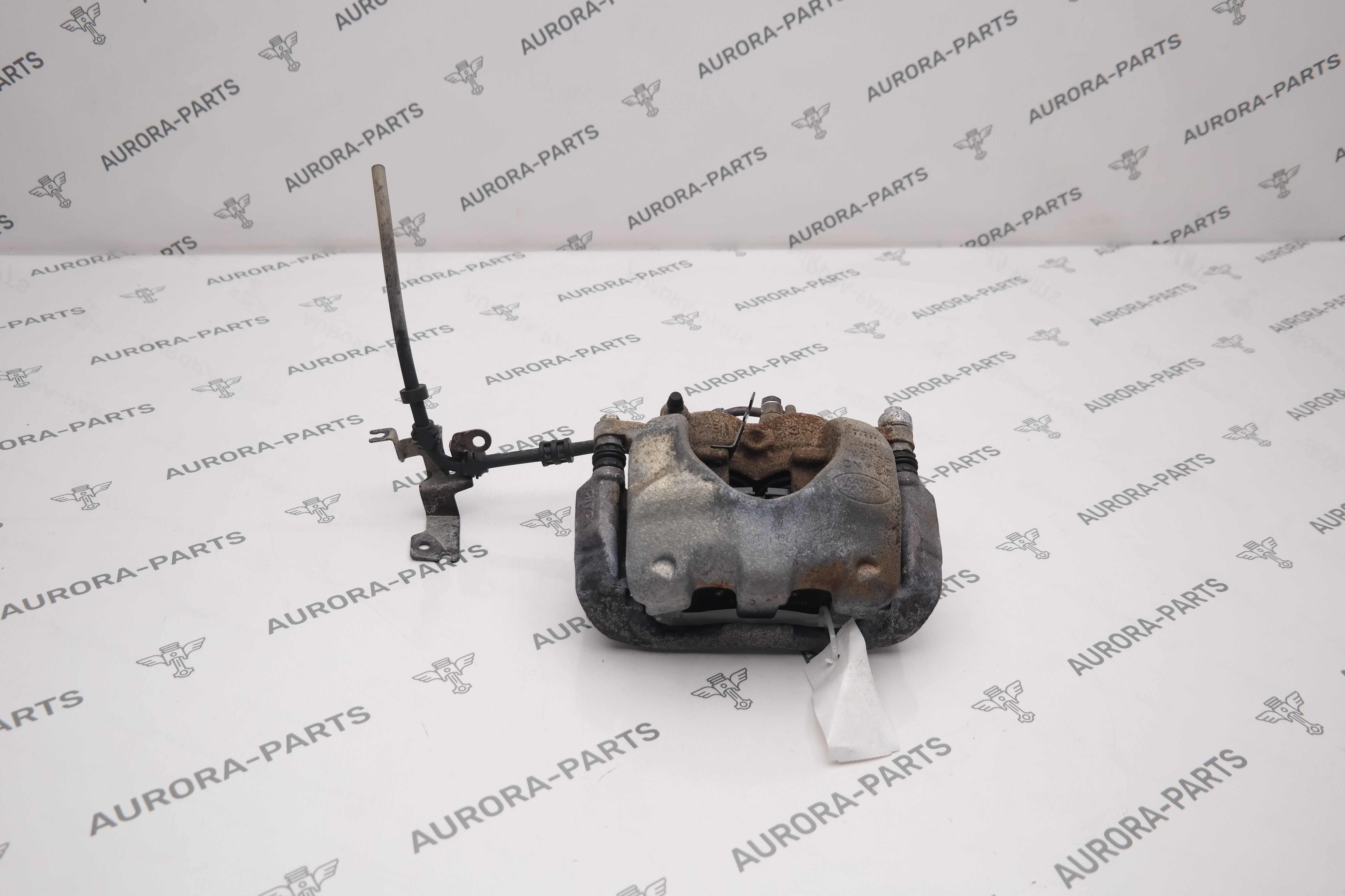 Суппорт тормозной передний LH Land Rover Defender