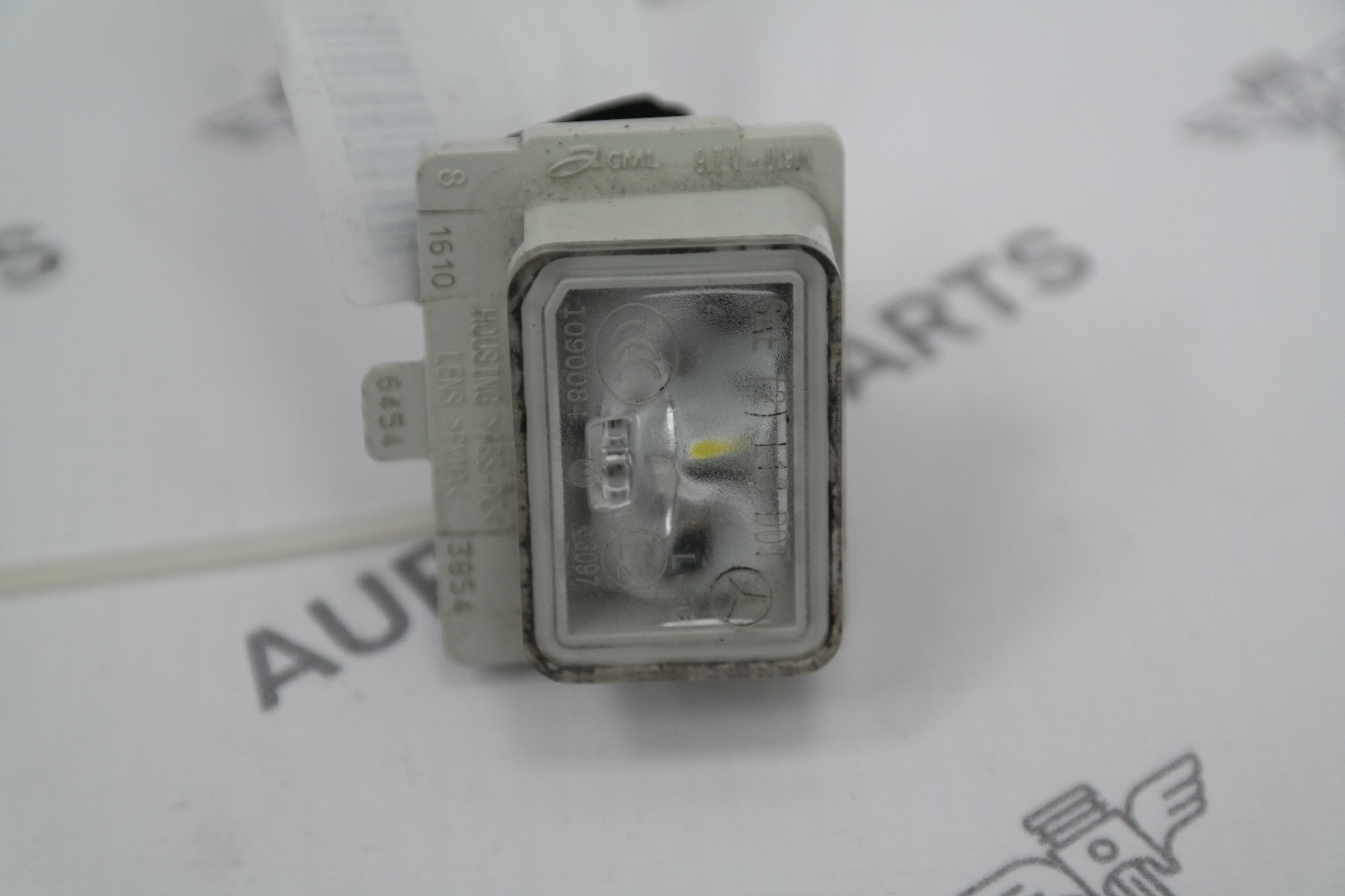 Фонарь подсветки номера Mercedes C-Klasse