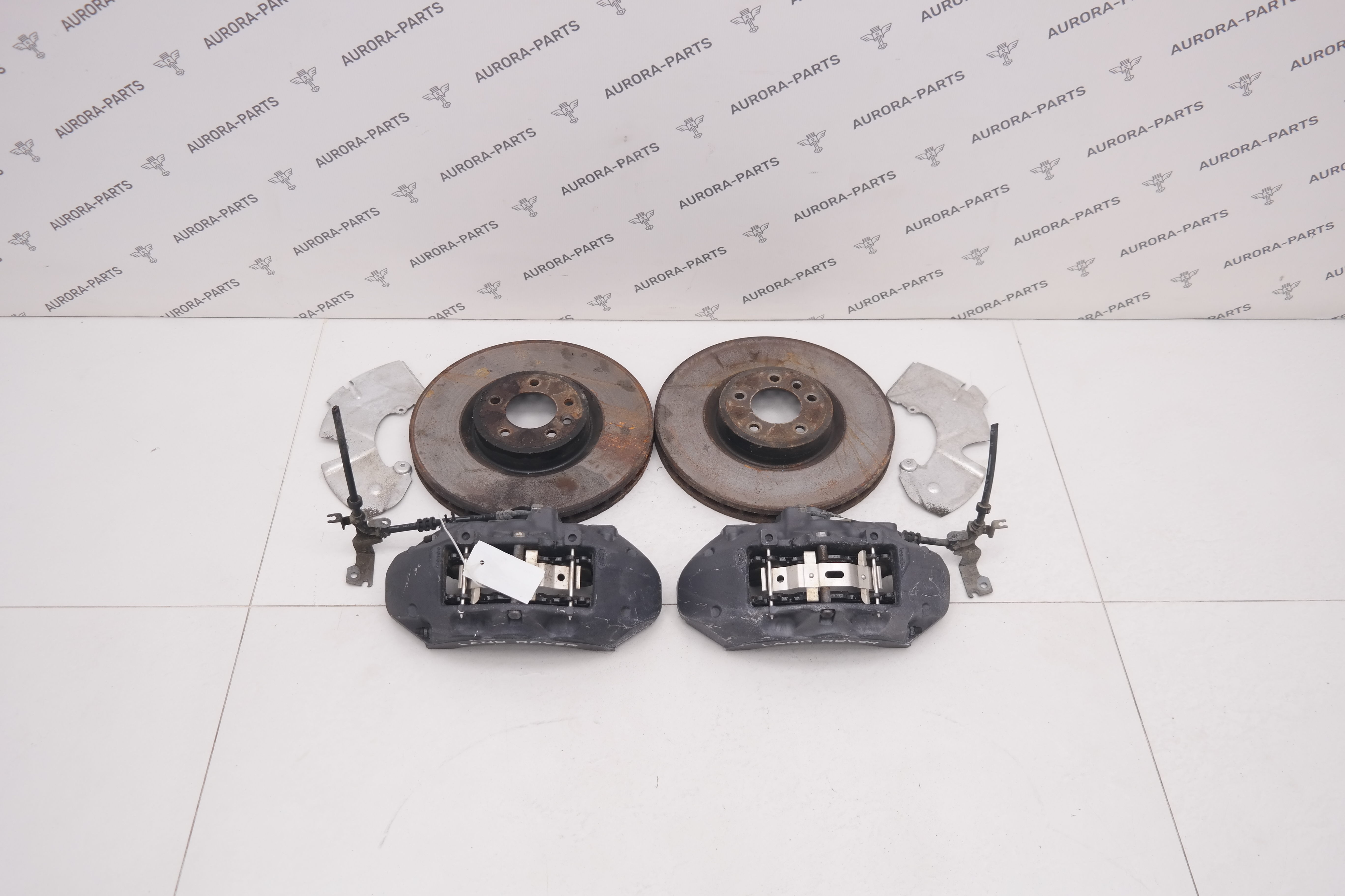 Комплект передних тормозов (суппорта, диски, пыльники) Land Rover Discovery