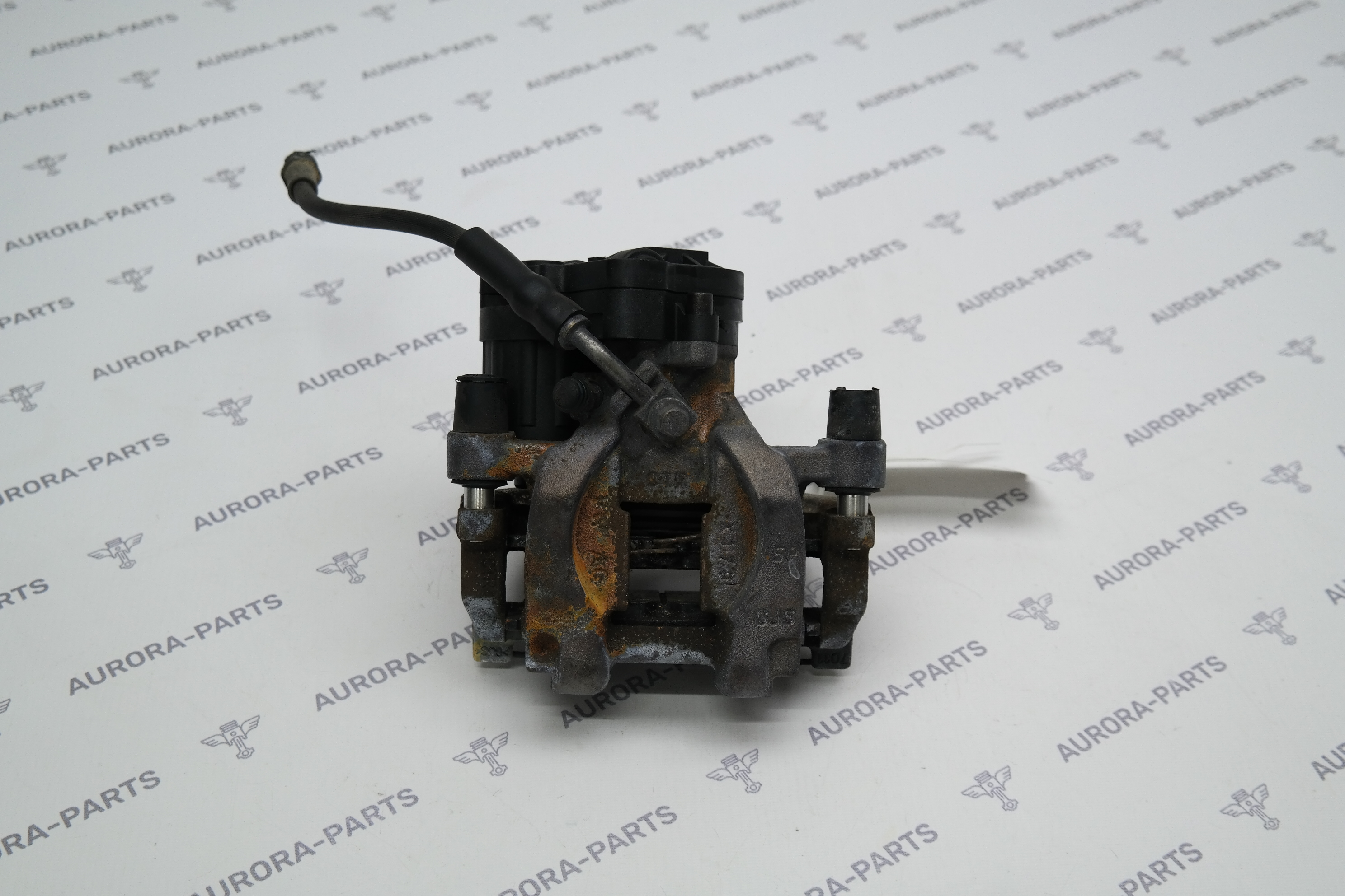 Суппорт тормозной задний RH VW Tiguan