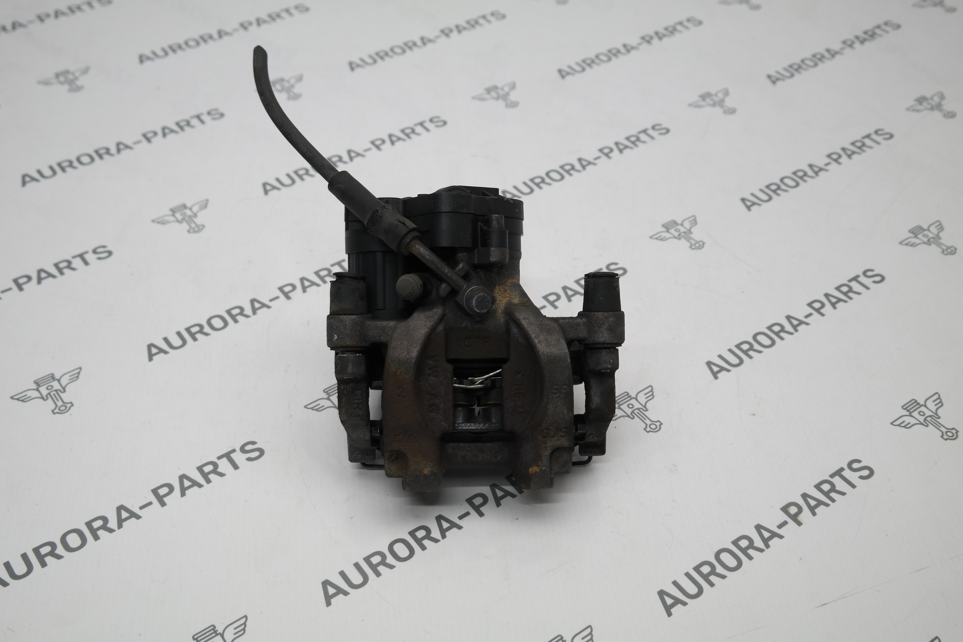 Суппорт тормозной задний RH VW Tiguan