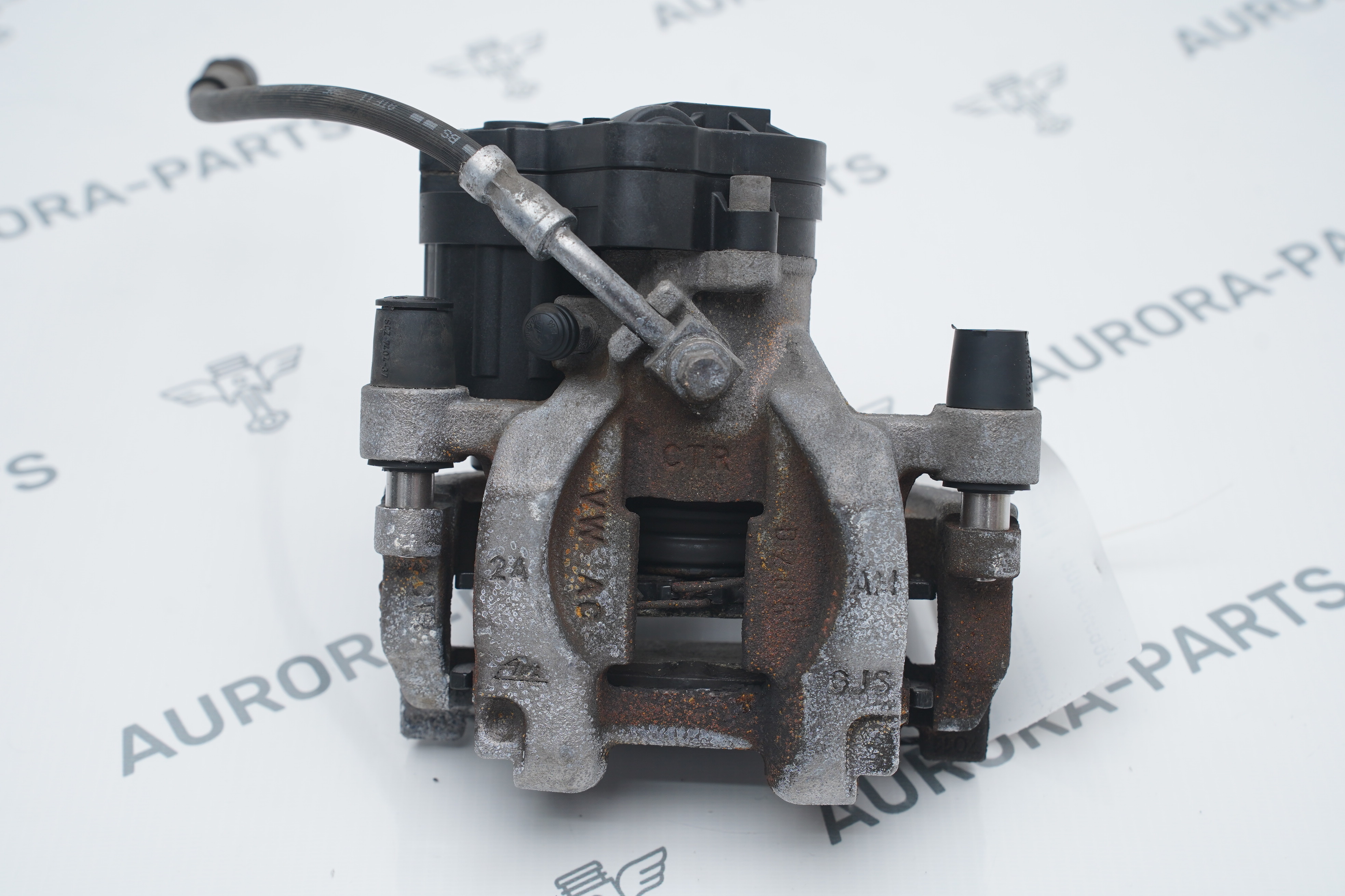 Суппорт тормозной задний LH VW Tiguan